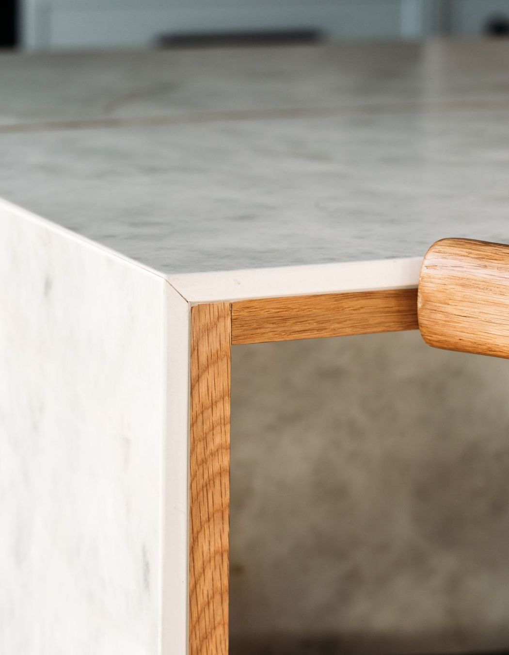 Solid oak negative detail in the porcelain benchtop.