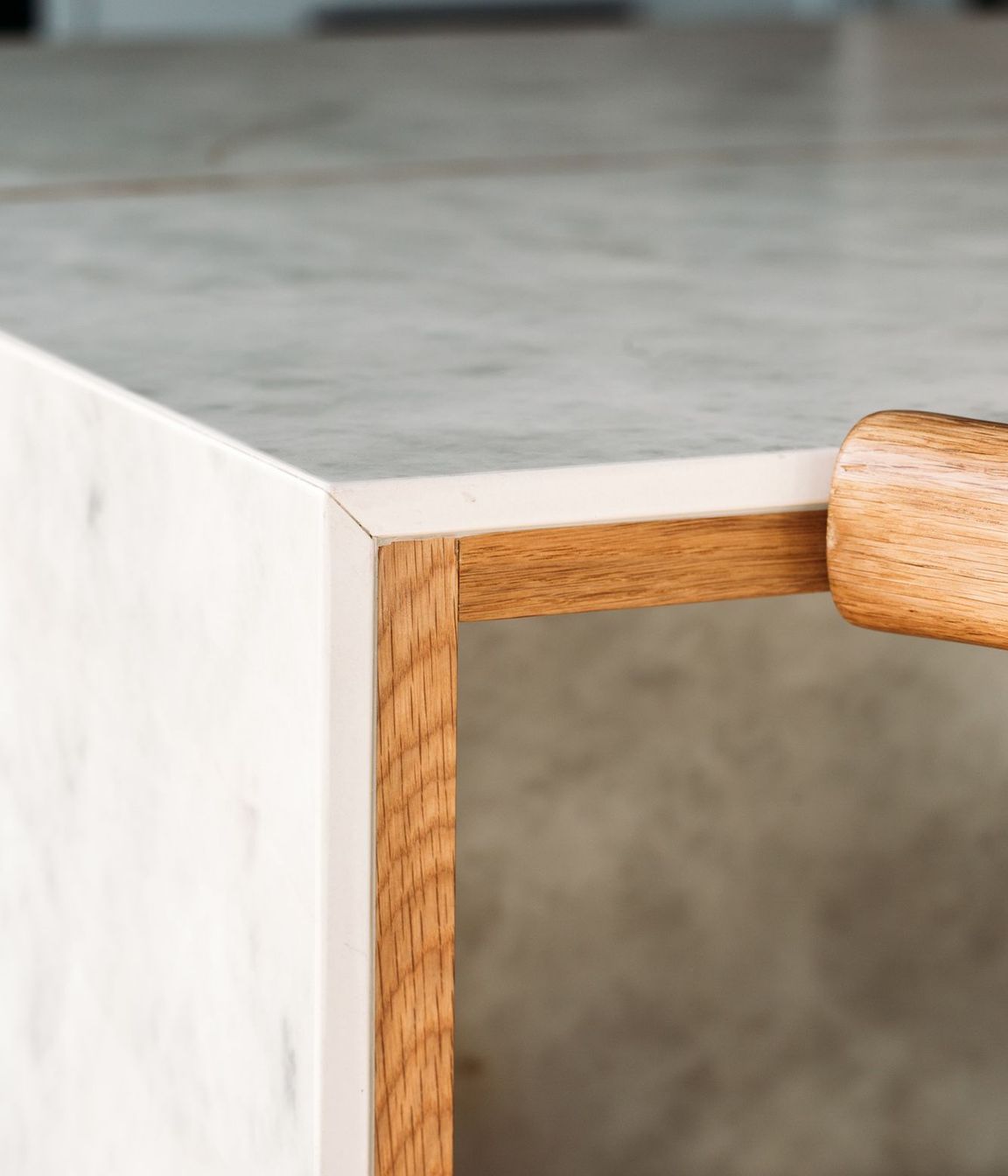 Solid oak negative detail in the porcelain benchtop.