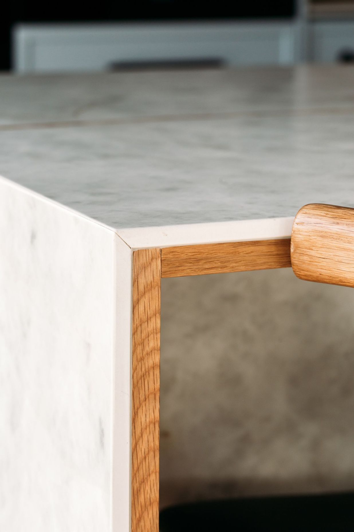 Solid oak negative detail in the porcelain benchtop.