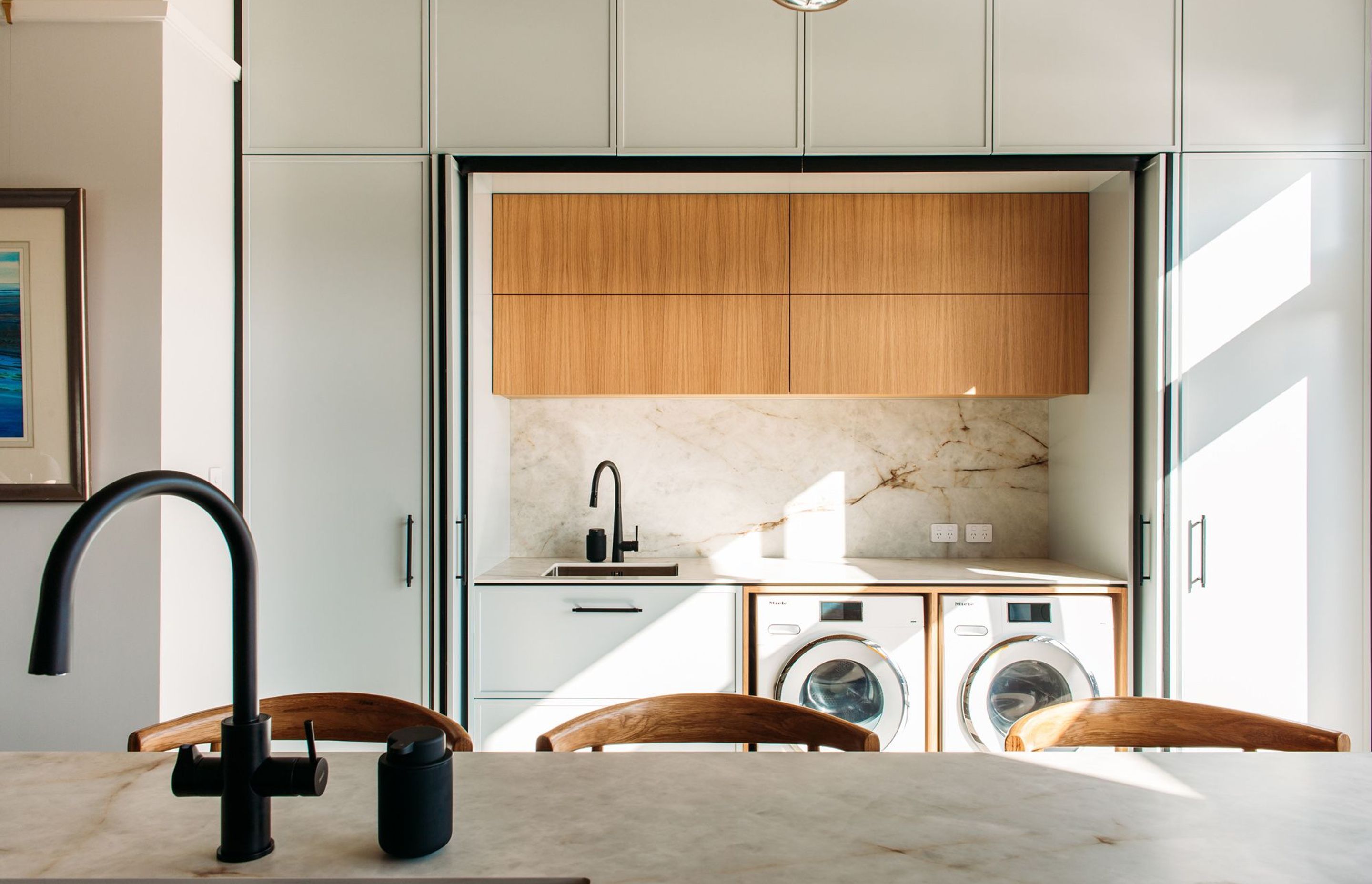 The laundry is well designed into this interior.