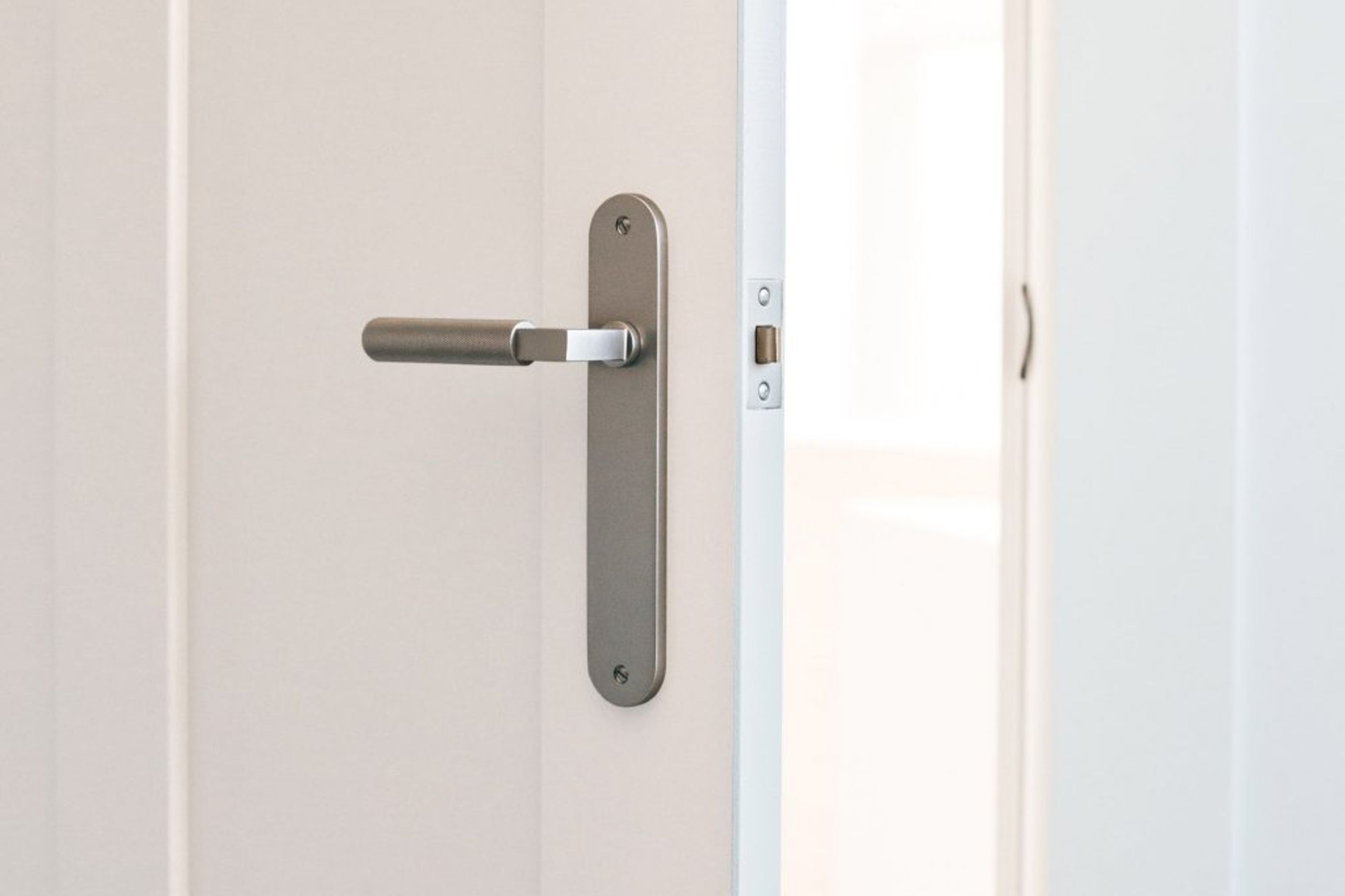 Kyal-Karas-Brunswick-Lever-On-Oval-Backplake-Satin-Nickel-3.jpeg