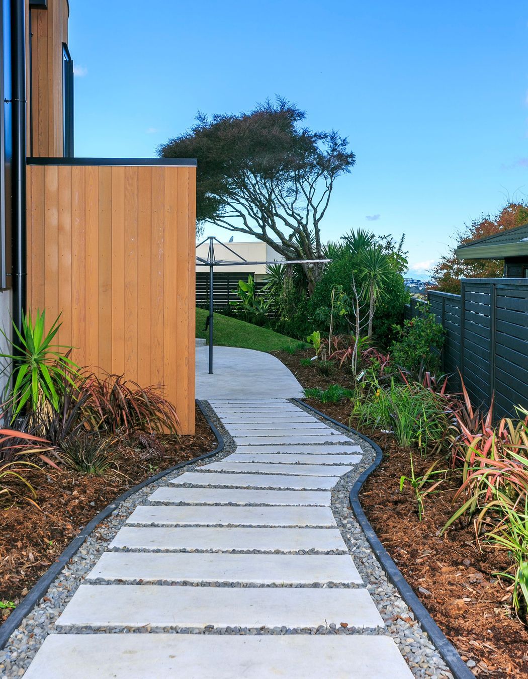 All new drainage was installed as well as in situ concrete pavers and landscaping.