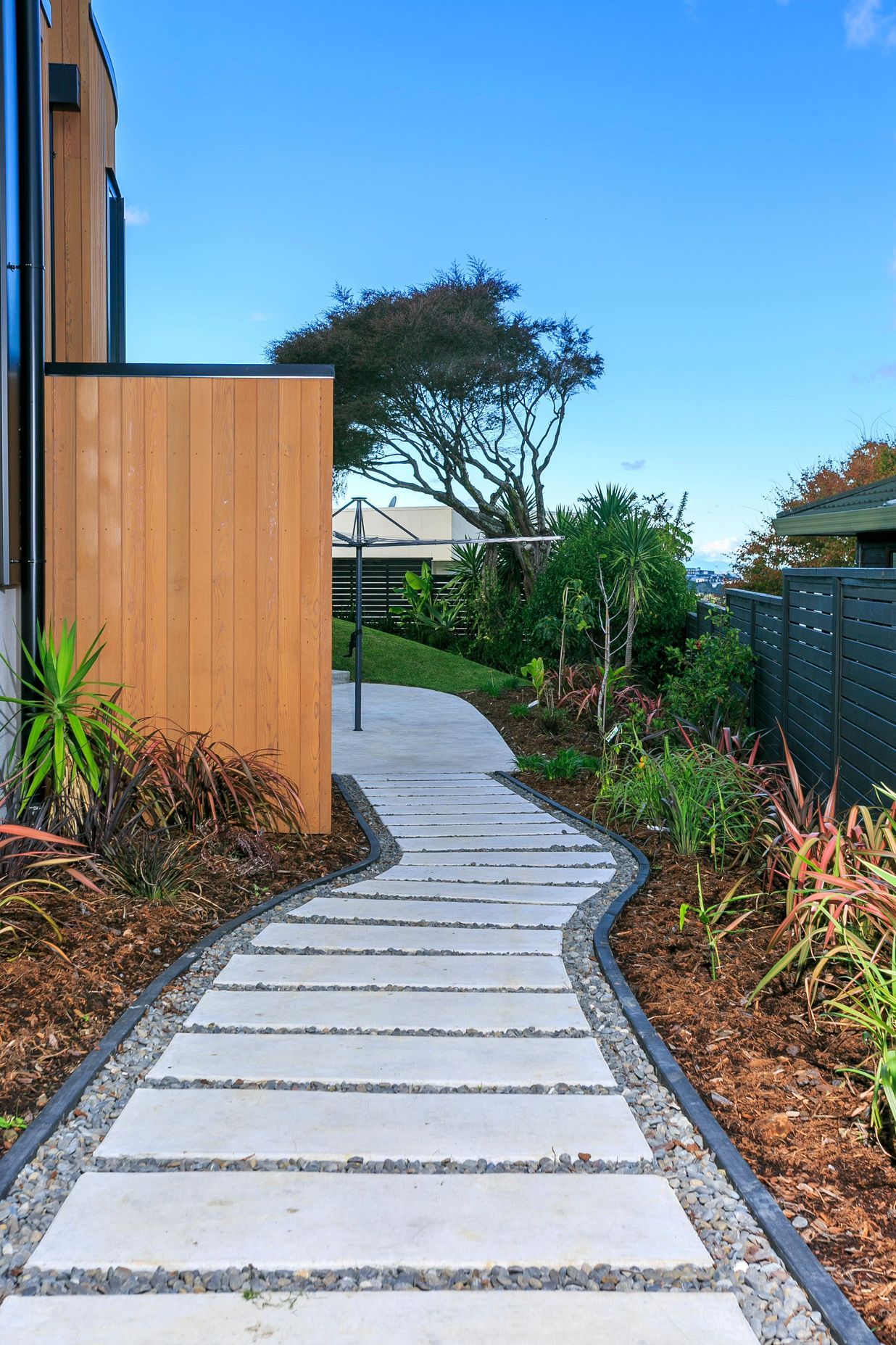 All new drainage was installed as well as in situ concrete pavers and landscaping.