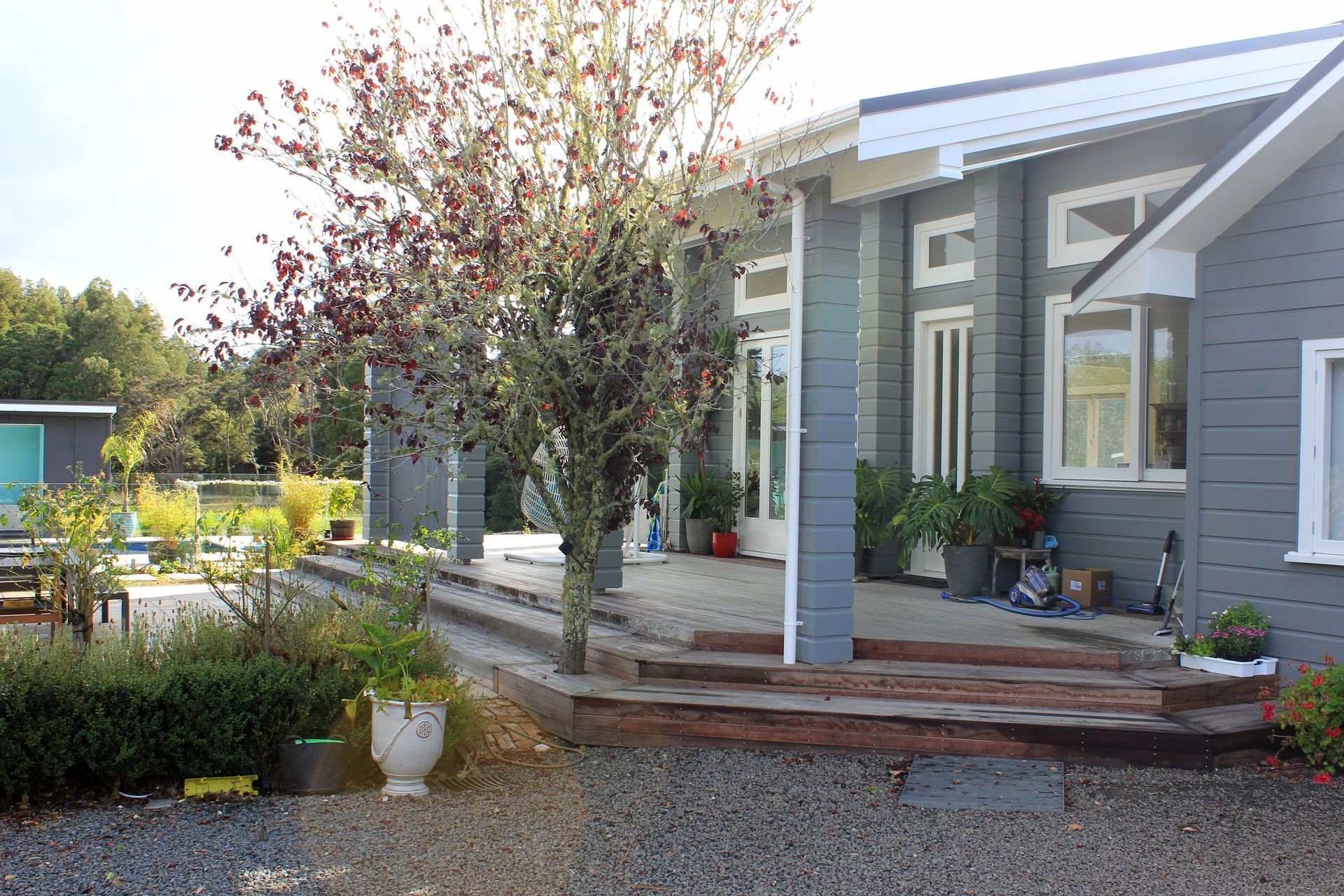 Cain Built - Coatesville Bungalow renovation- covered deck area and new entry landscaping