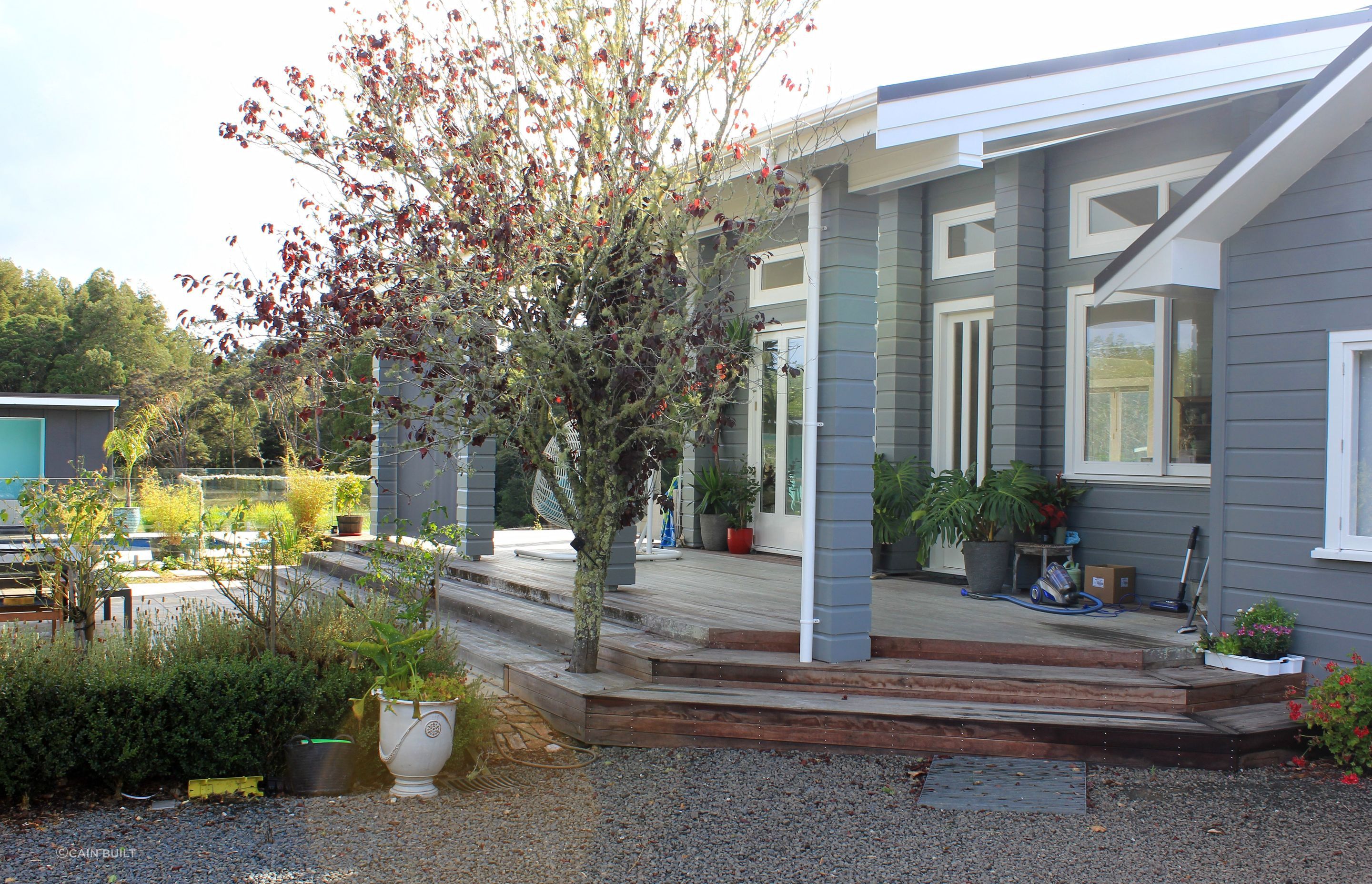 Cain Built - Coatesville Bungalow renovation- covered deck area and new entry landscaping