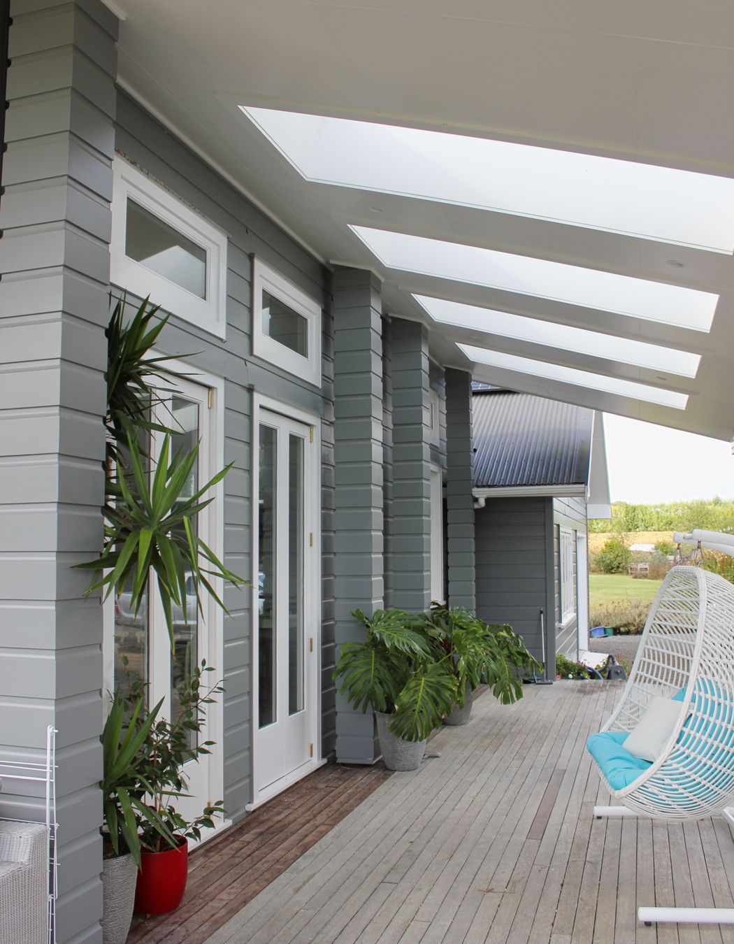 Cain Built - Coatesville Bungalow renovation- Covered deck with Adlux skylights