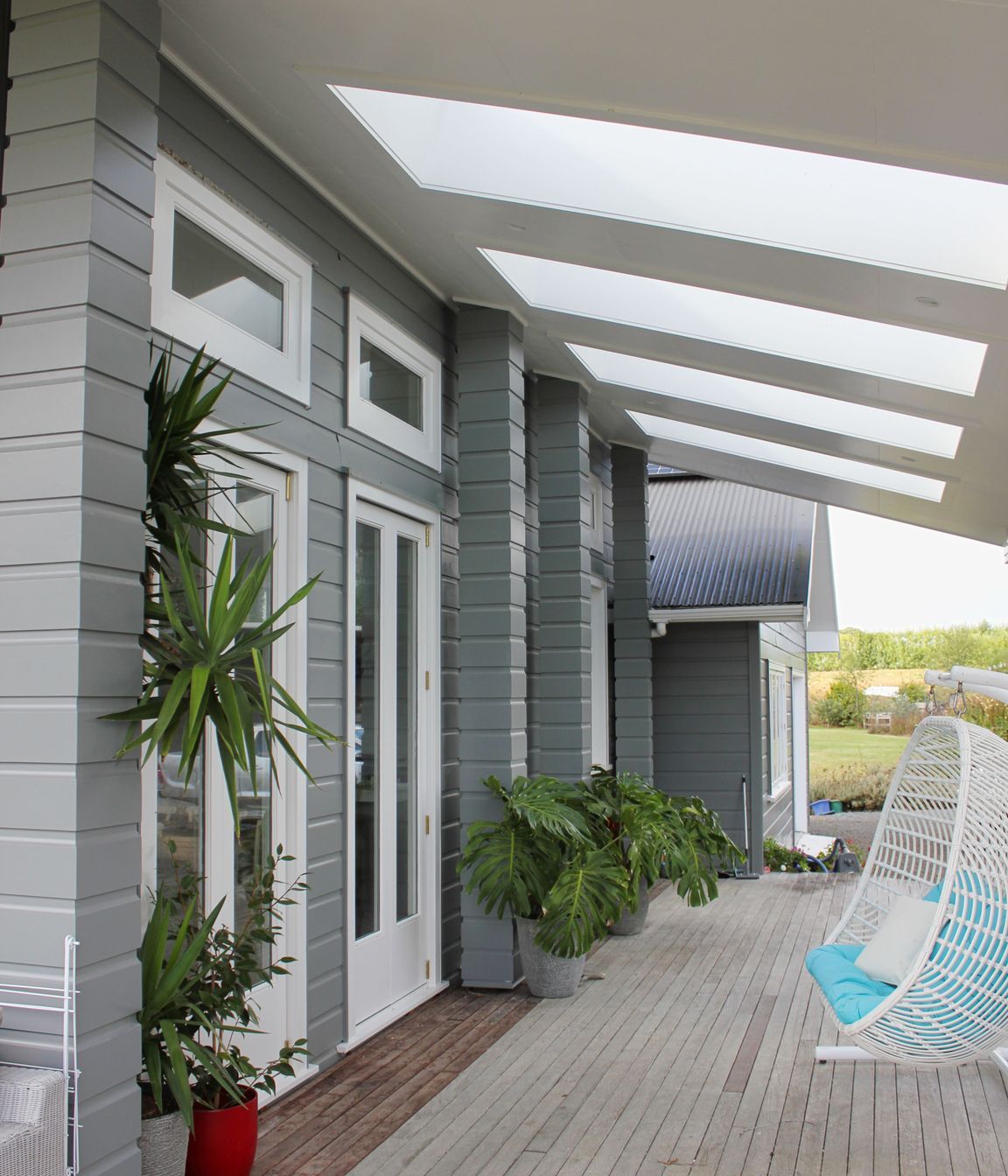 Cain Built - Coatesville Bungalow renovation- Covered deck with Adlux skylights