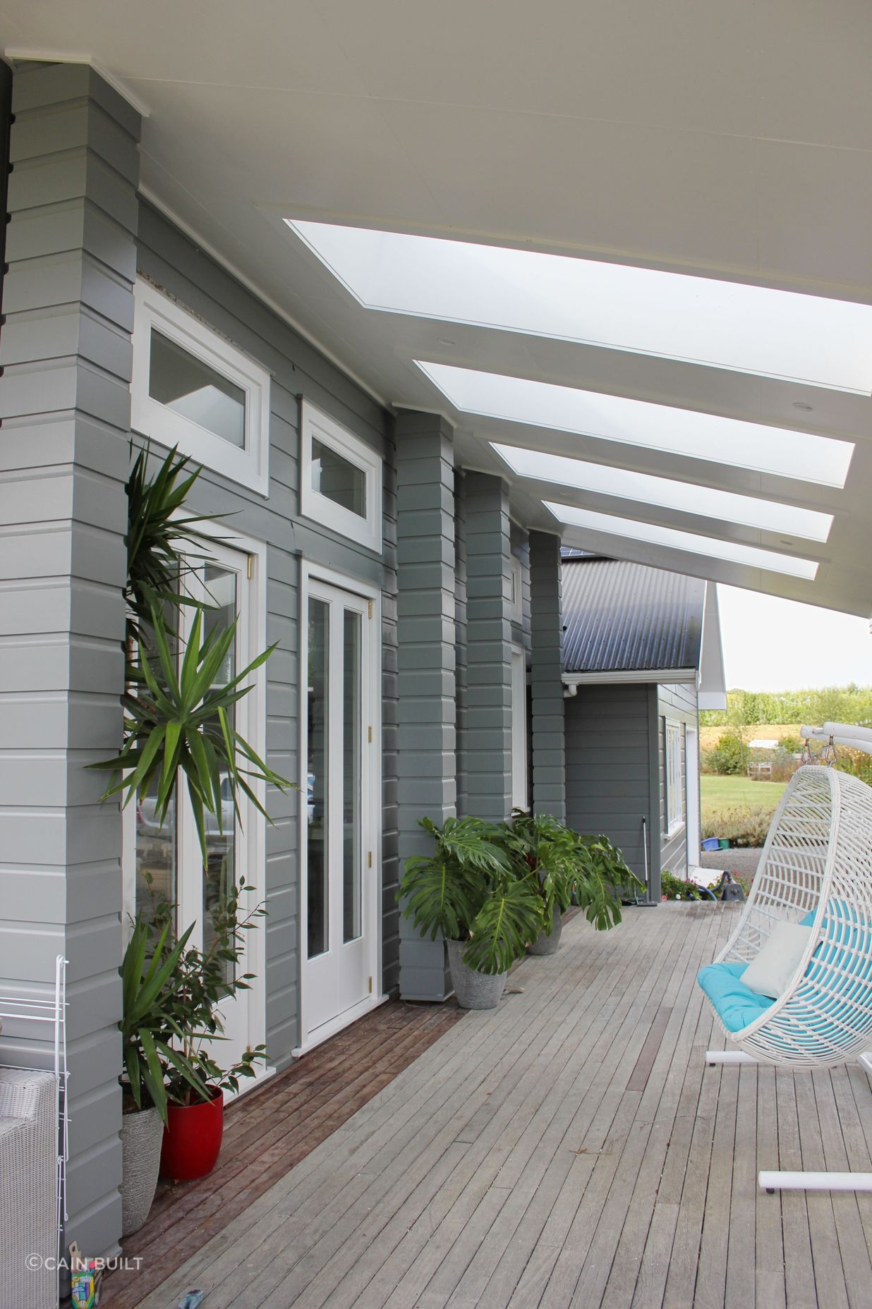 Cain Built - Coatesville Bungalow renovation- Covered deck with Adlux skylights