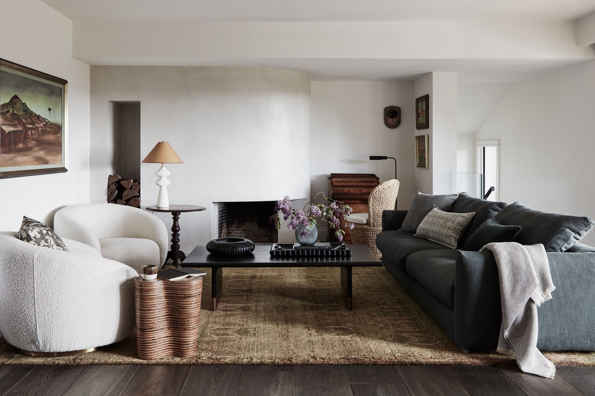 LIVING ROOM Flexform Grandemare sofa, Fanuli. Brice swivel chair, James Said. Nuria desk chair, Made Goods. Floor lamp, Bloomingdales Lighting. Arteriors ‘Lawson’ coffee table, Boyd Blue. Showtime Orgo side table, Oggetti Designs. Danny Kaplan Studio Pollux table lamp, Spartan Shop. Rug, owners’ own.