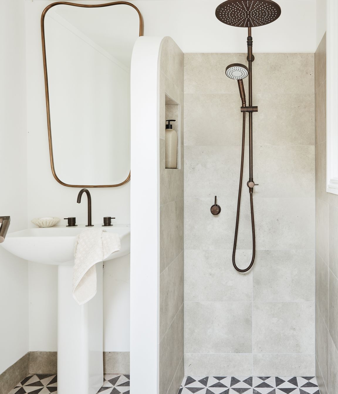 POOL AREA BATHROOM Windmill mosaic floor tiles, Tilecraft. Gage mirror, Made Goods. Brodware ‘Minim’ basin set, ‘City Plus’ shower set and Duravit ‘ME’ pedestal basin, all Sydney Tap and Bathroomware