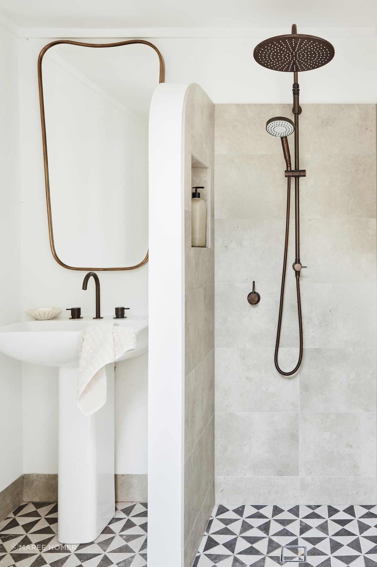 POOL AREA BATHROOM Windmill mosaic floor tiles, Tilecraft. Gage mirror, Made Goods. Brodware ‘Minim’ basin set, ‘City Plus’ shower set and Duravit ‘ME’ pedestal basin, all Sydney Tap and Bathroomware