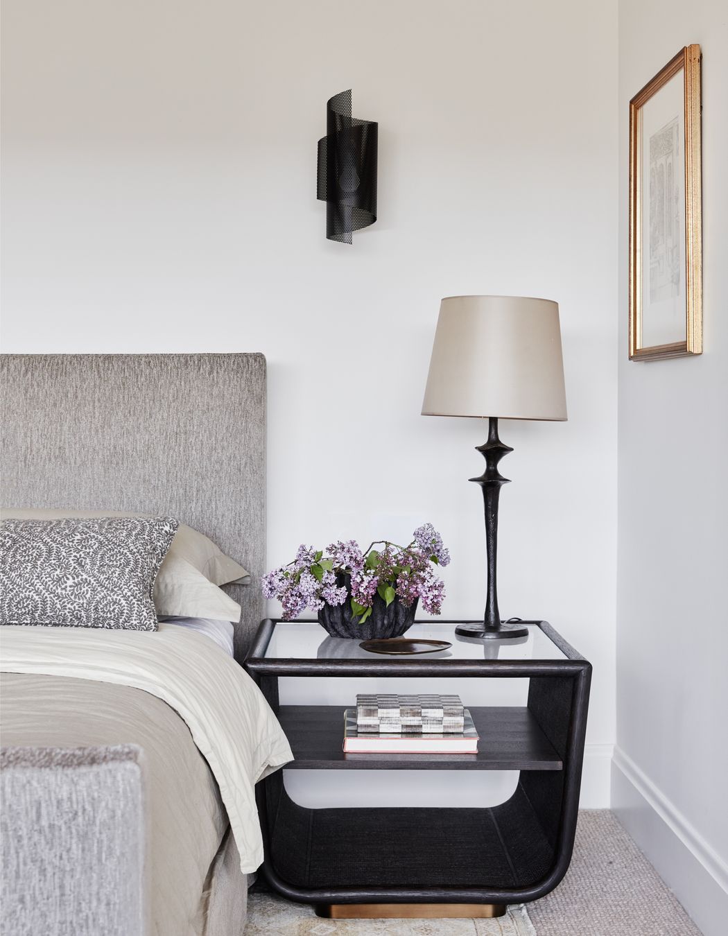 MAIN BEDROOM Spun Tulle wall sconce, Blueprint Lighting, NYC. Table lamp, Objet Insolite. McGuire Ladera side table, Studio Cavit. Custom bedhead in Suzanne Tucker ‘Geoffrey’ fabric, Tigger Hall Design. Busatti bedlinen, Kate Nixon.