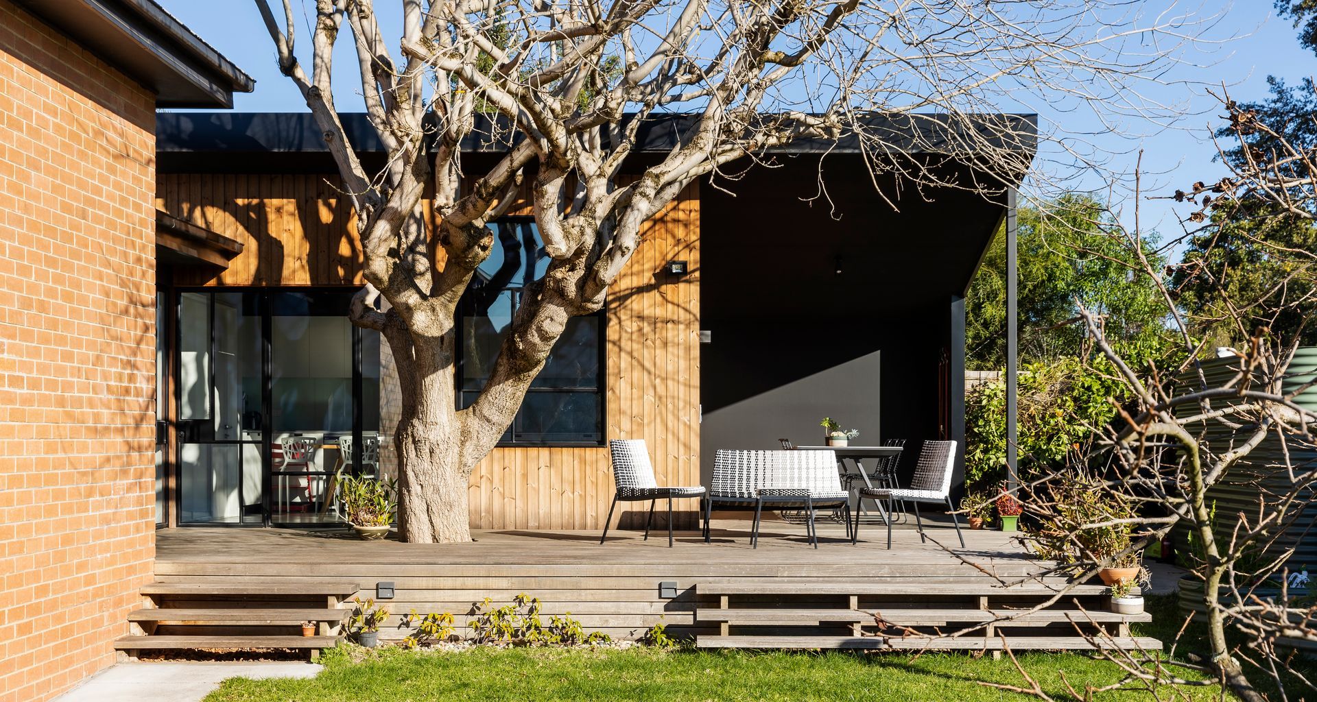 The extension to the house now faces the garden with a sunny outdoor entertaining deck