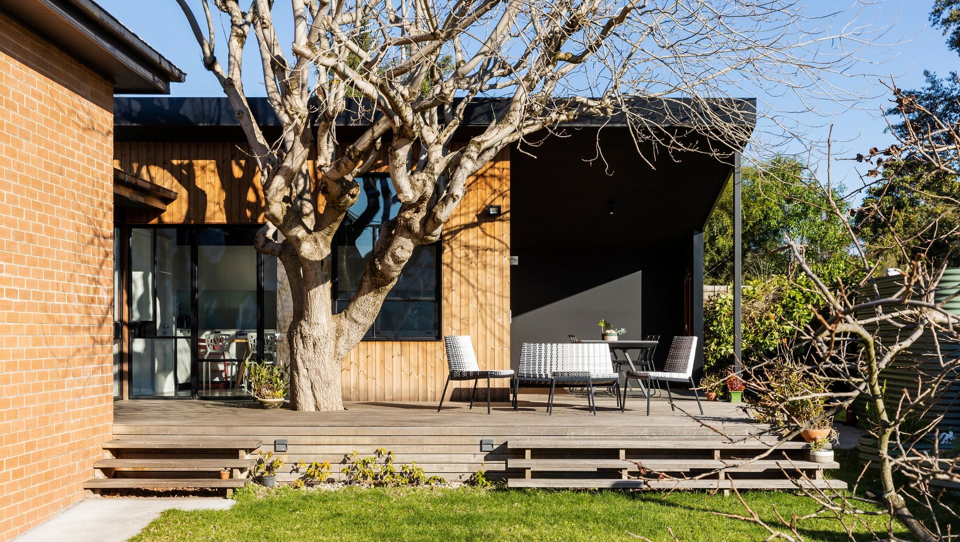 The extension to the house now faces the garden with a sunny outdoor entertaining deck