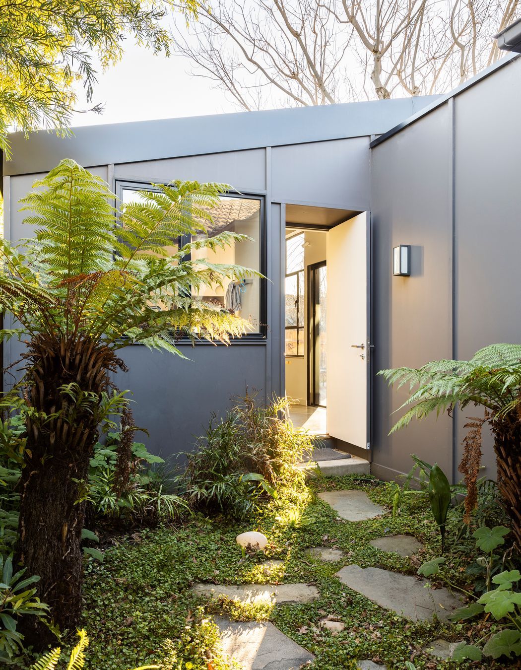 A shady courtyard was created on the south side of the house