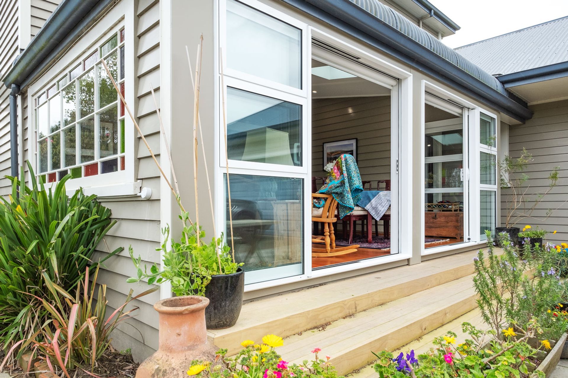A Functional Formal Sunroom Complements 19th Century Home