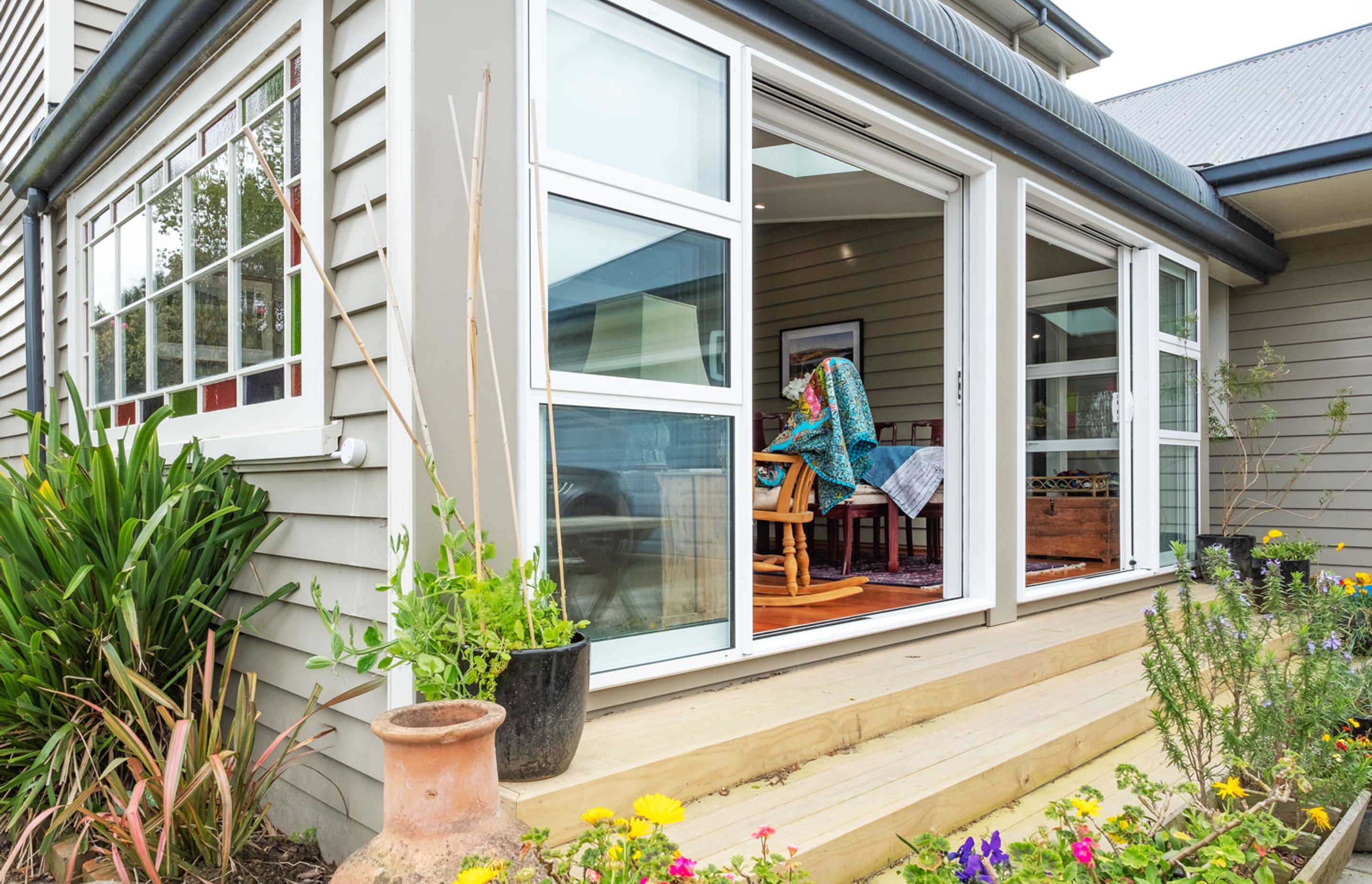 A Functional Formal Sunroom Complements 19th Century Home