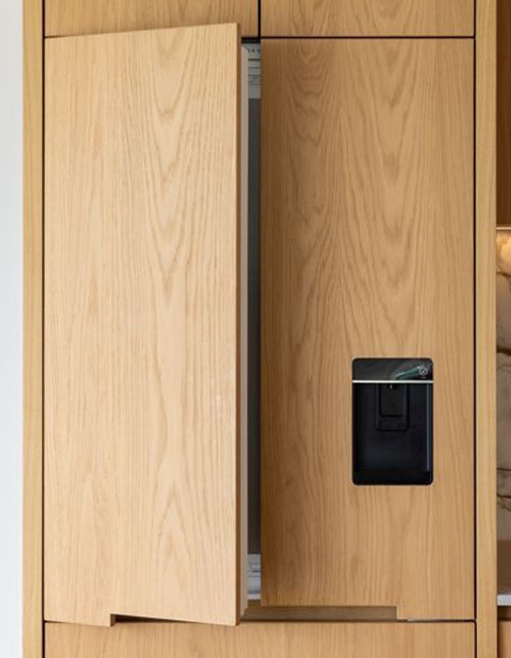 NeoDesigncustomkitchenrenovationdesignerAucklandcontemporayoakcalacattamarbleintegrated-fridge.jpg