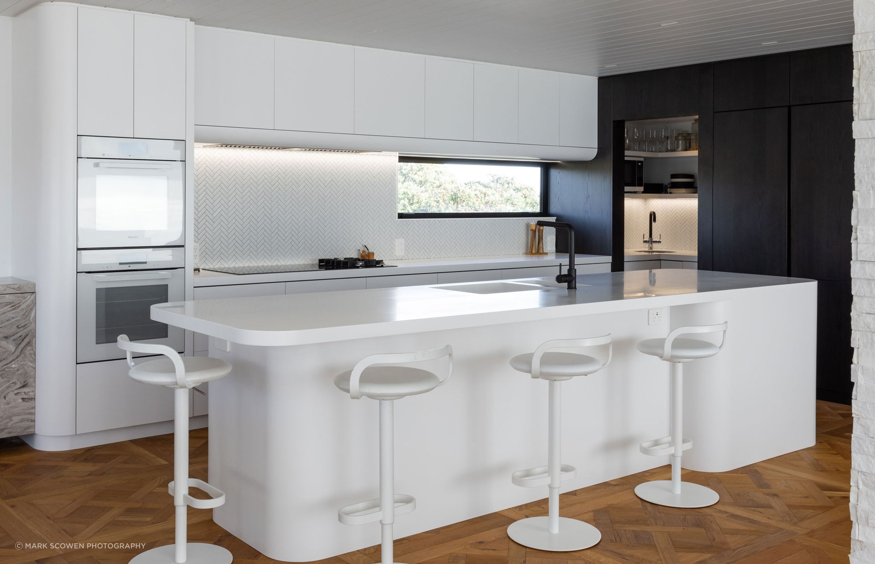 NeoDesigncustomkitchenrenovationdesignerAucklandminimalistwhitecurves1.jpg