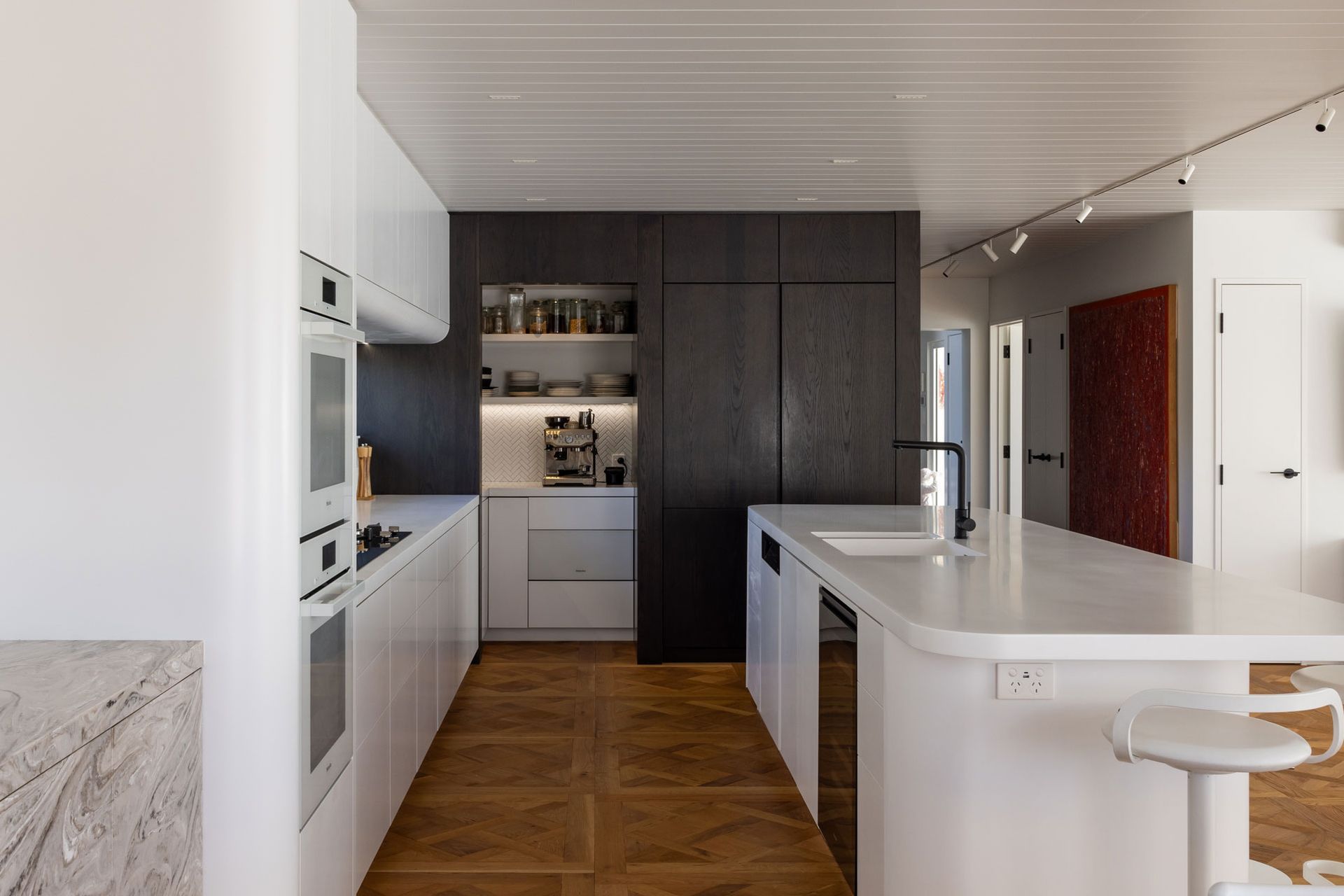 NeoDesigncustomkitchenrenovationdesignerAucklandminimalistwhitecurves5.jpg