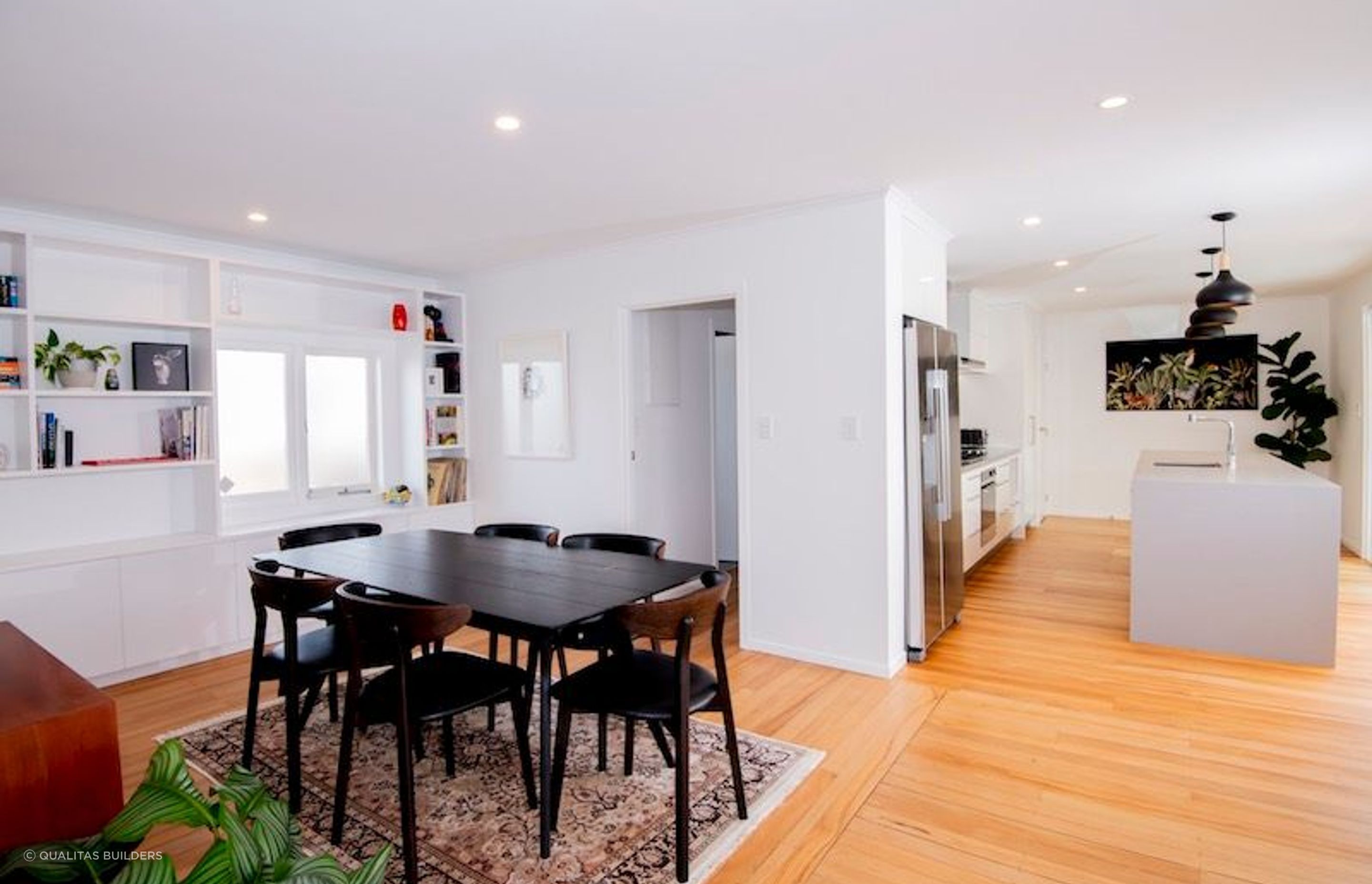 Removing the wall between the kitchen, dining and lounge created a brighter space.