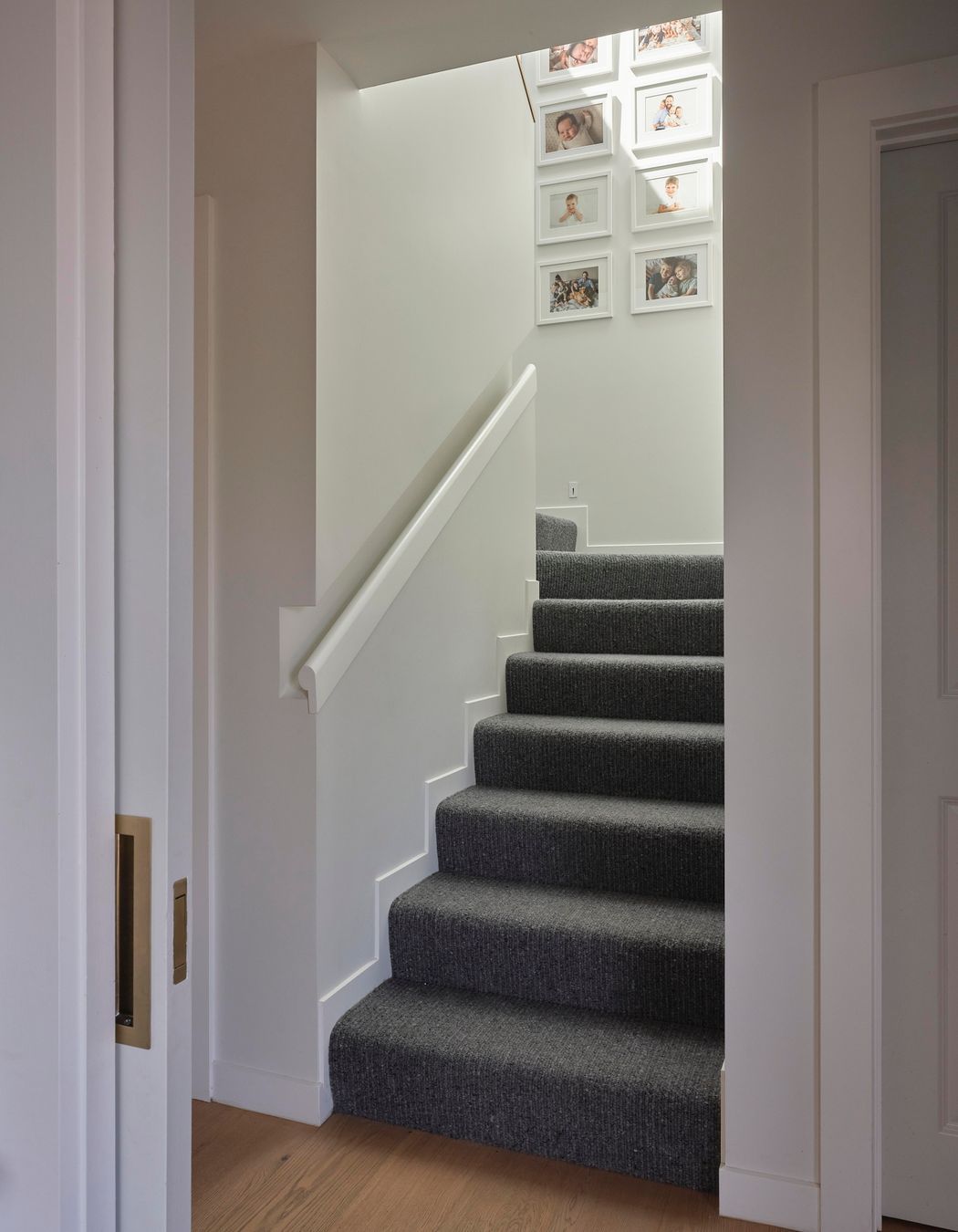 Pop-TopView-of-stairway-with-light-streaming-in-from-the-skylightSam-Hartnett-Photographer8.jpg