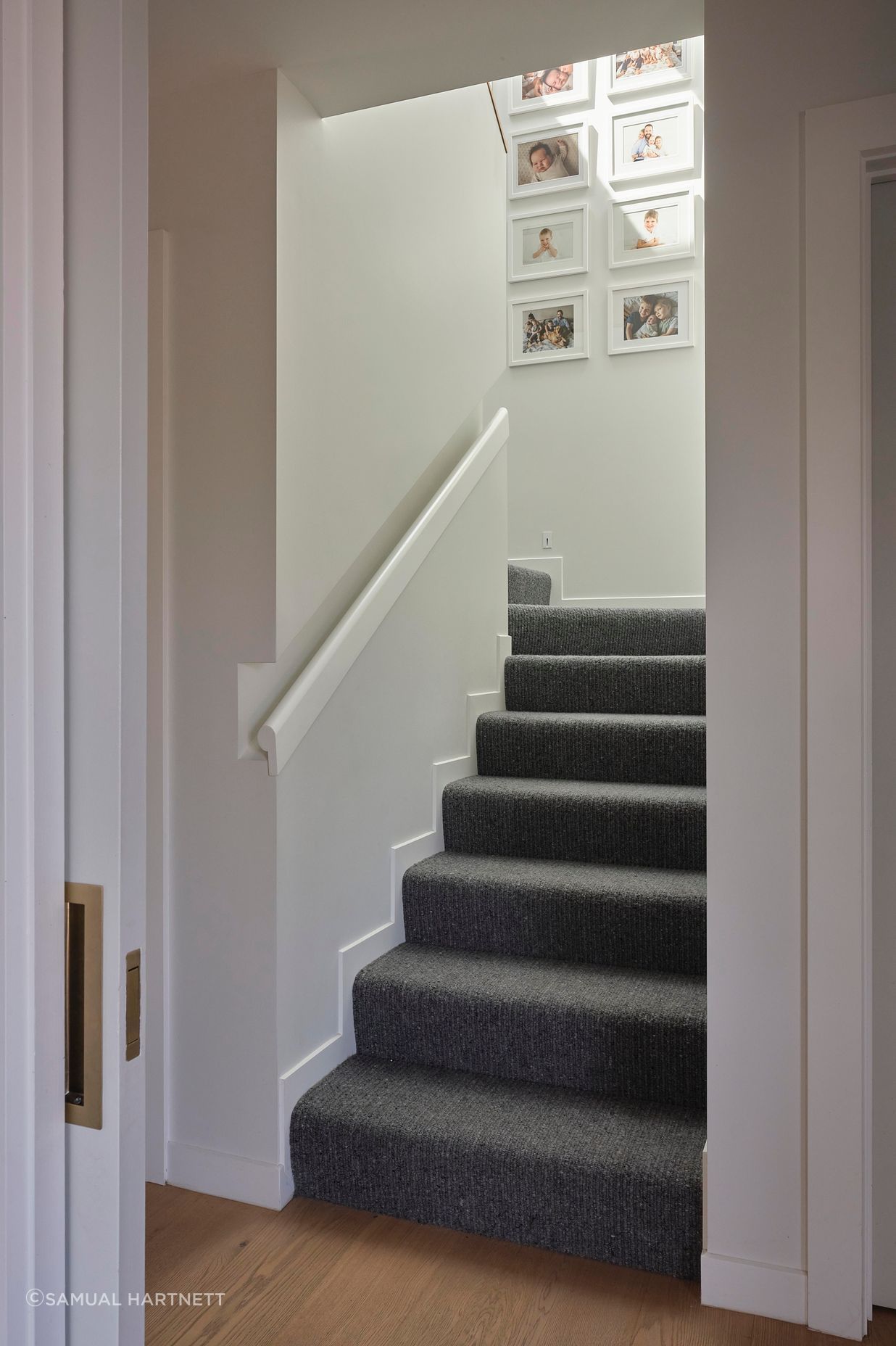 Pop-TopView-of-stairway-with-light-streaming-in-from-the-skylightSam-Hartnett-Photographer8.jpg