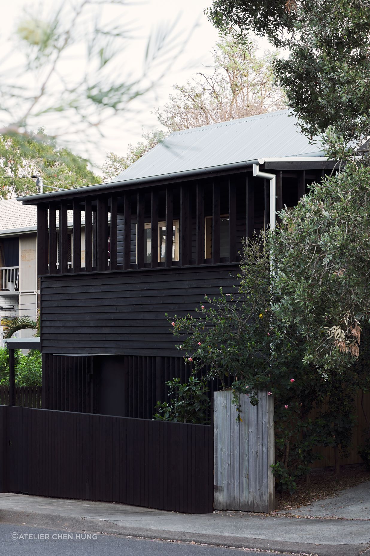 A rhythmic facade acts to mediate the house's relationship to the street, allowing various gradients of privacy, engagement, and views.