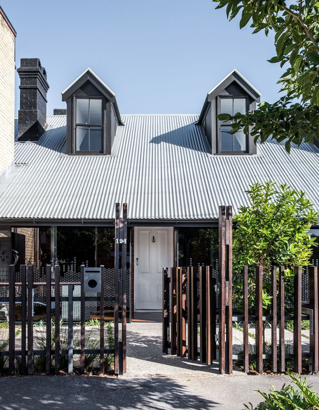 Photography: Cathy Schusler | Each office suite has its own entry and private front yard.