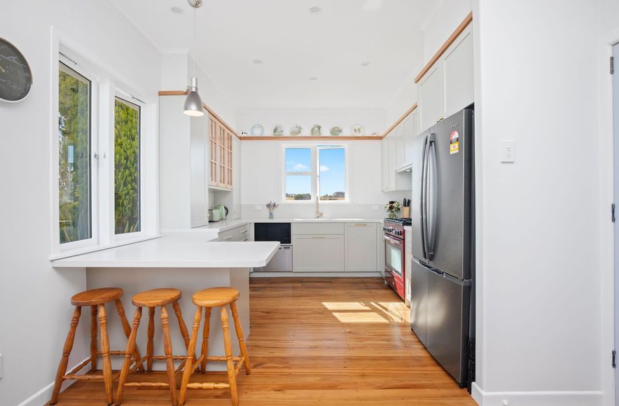 A Kitchen Refresh With Rimu Floorboard Restoration In Auckland