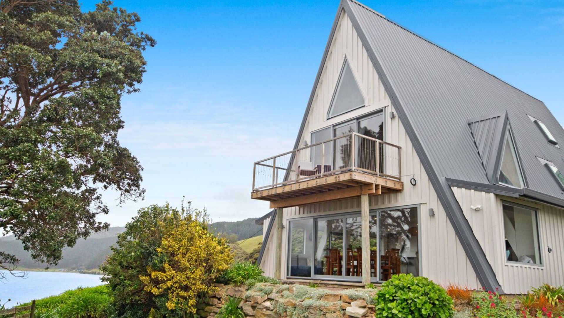1970's A-Frame Bach Converted To Home In Port Waikato banner