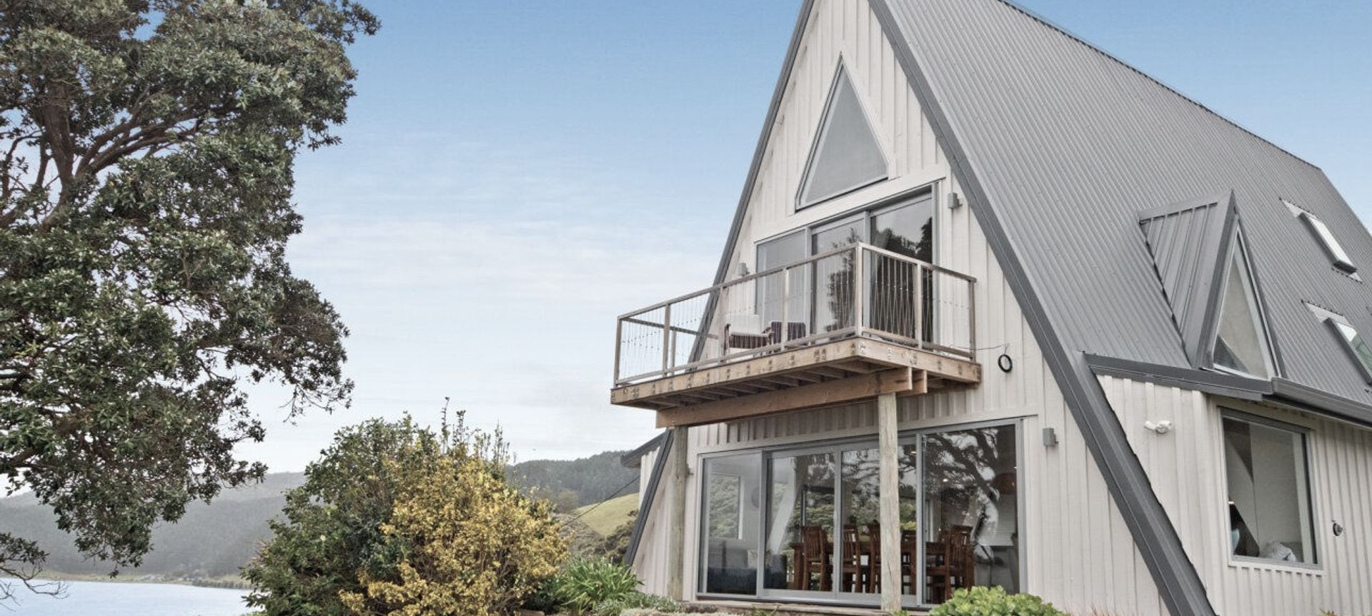 1970's A-Frame Bach Converted To Home In Port Waikato banner
