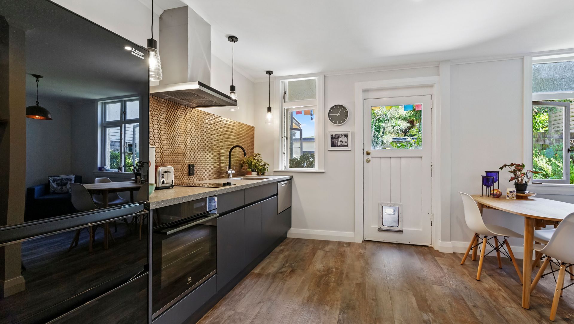 Compelling Character Design in this Wellington Kitchen and Bathroom banner