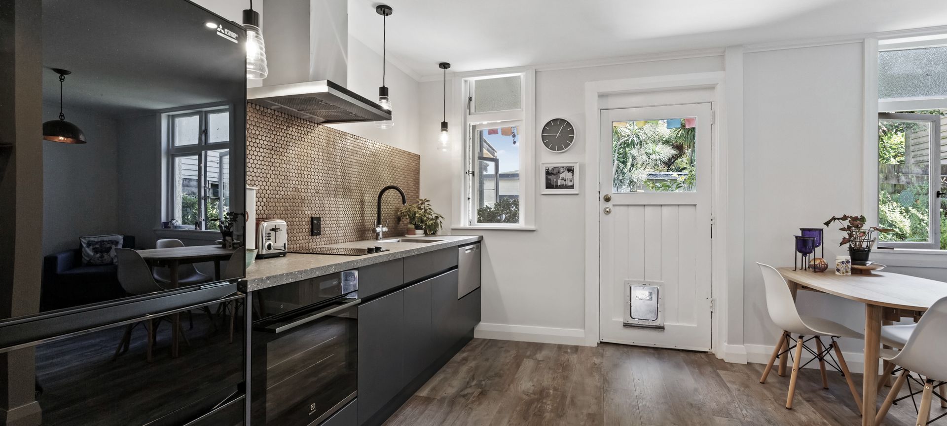 Compelling Character Design in this Wellington Kitchen and Bathroom banner