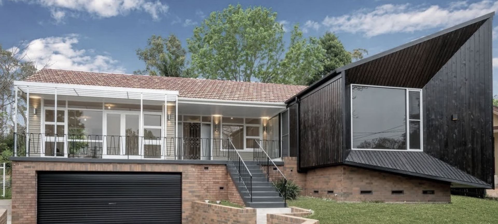 Original Mid Century Home with extensive internal planning changes. Bedroom wing to the west (right), and living to the east (left). Garage is now a useful space and double width; new front room has a peak to make the existing roof ridge; much needed shading to the north facing lounge and balcony
