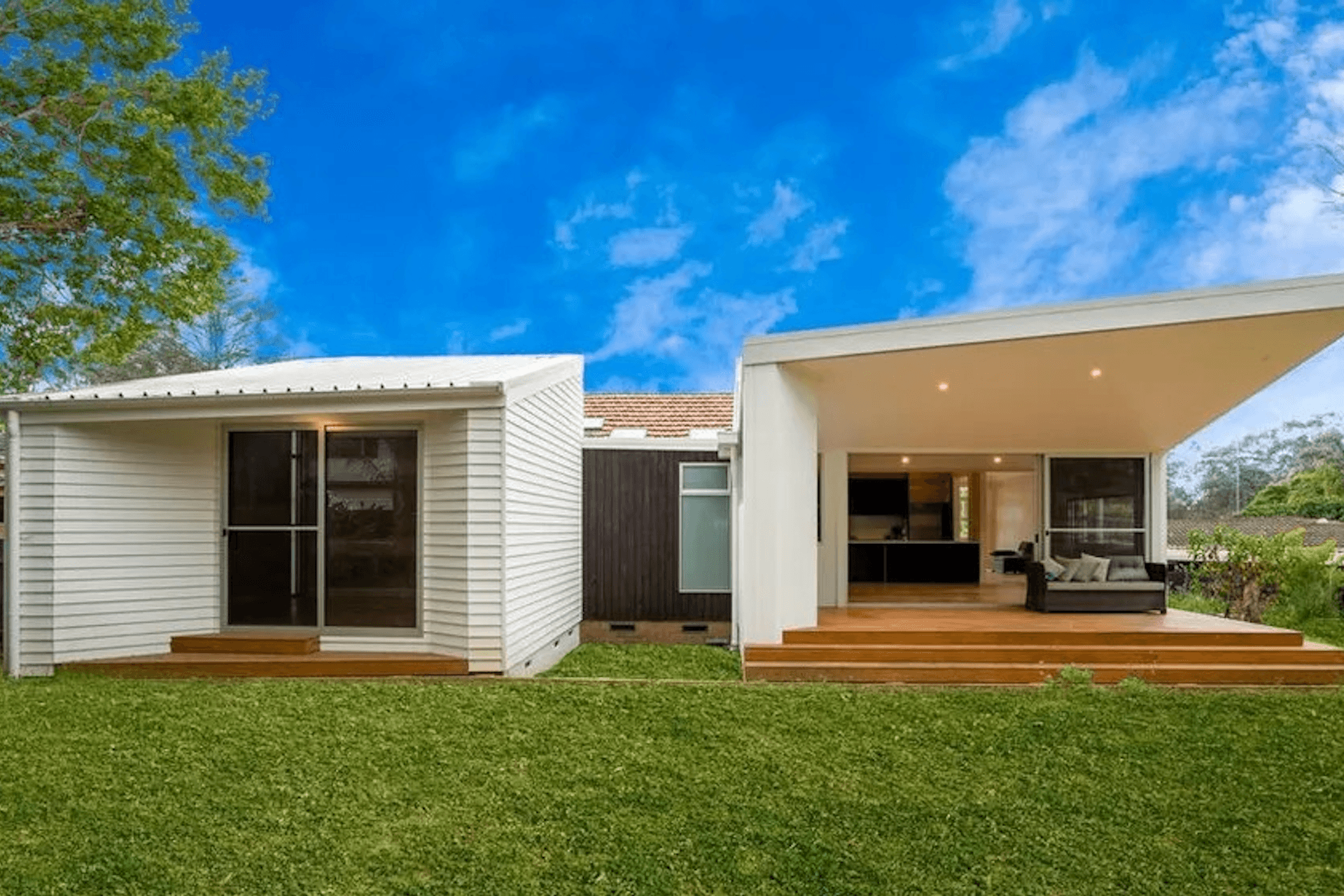Bedroom wing to the west (left) with Master Bedroom facing the large garden. Rear Living areas follow the east side of the cottage (right) and open onto the large garden