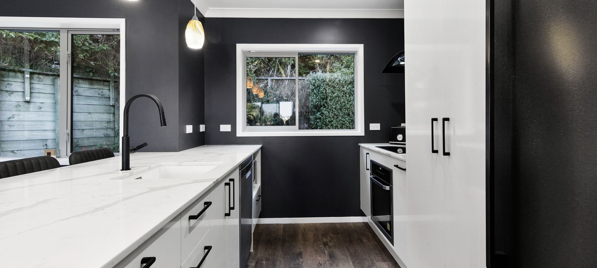 A tired Wellington kitchen gets an exciting new look with both stylish and practical elements achieved on a budget banner
