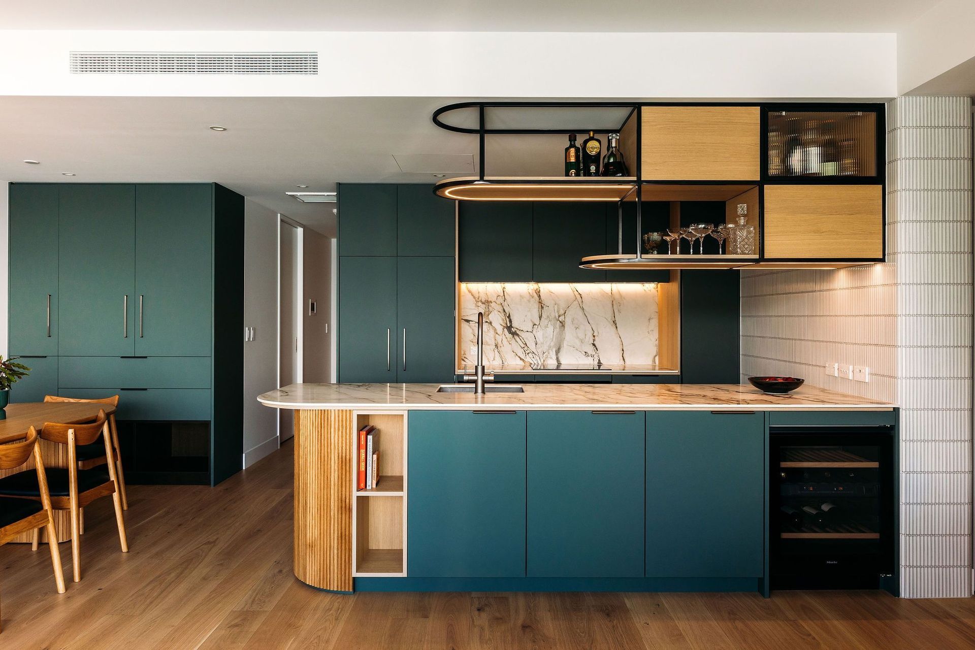 LED lights are installed in the underside of the overhead cabinet, and above the the hob.