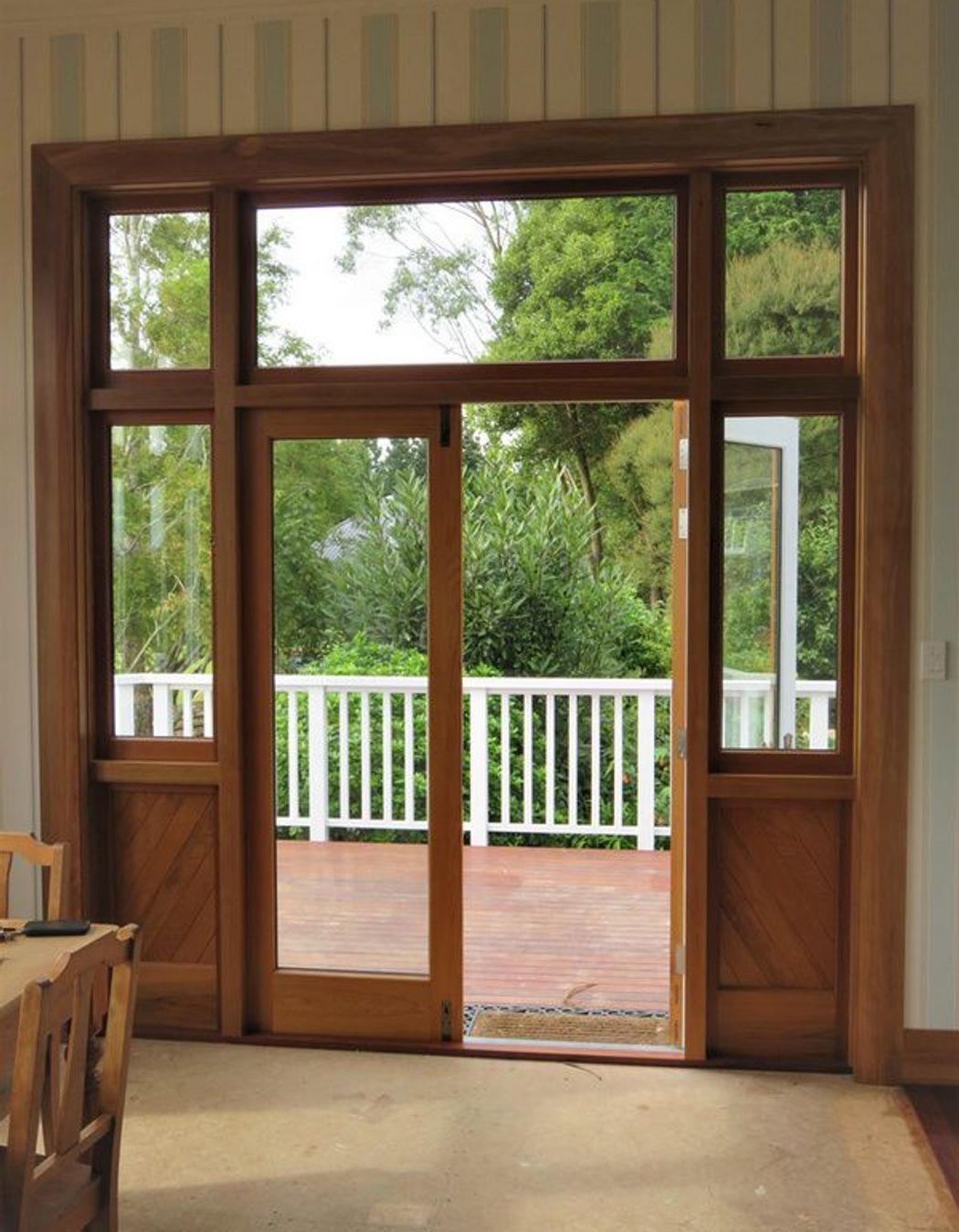 Wooden door with glass and wood detailing