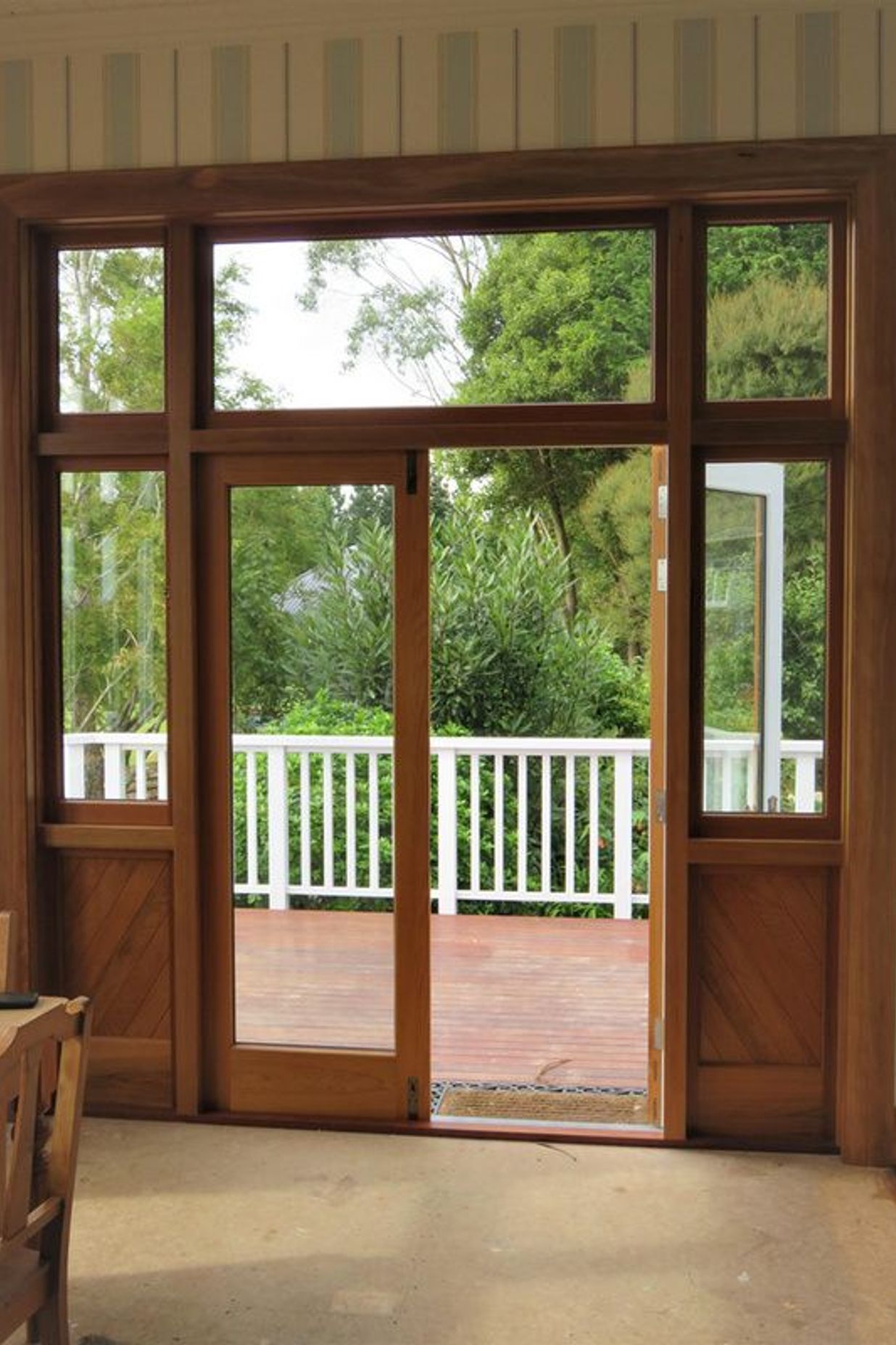 Wooden door with glass and wood detailing