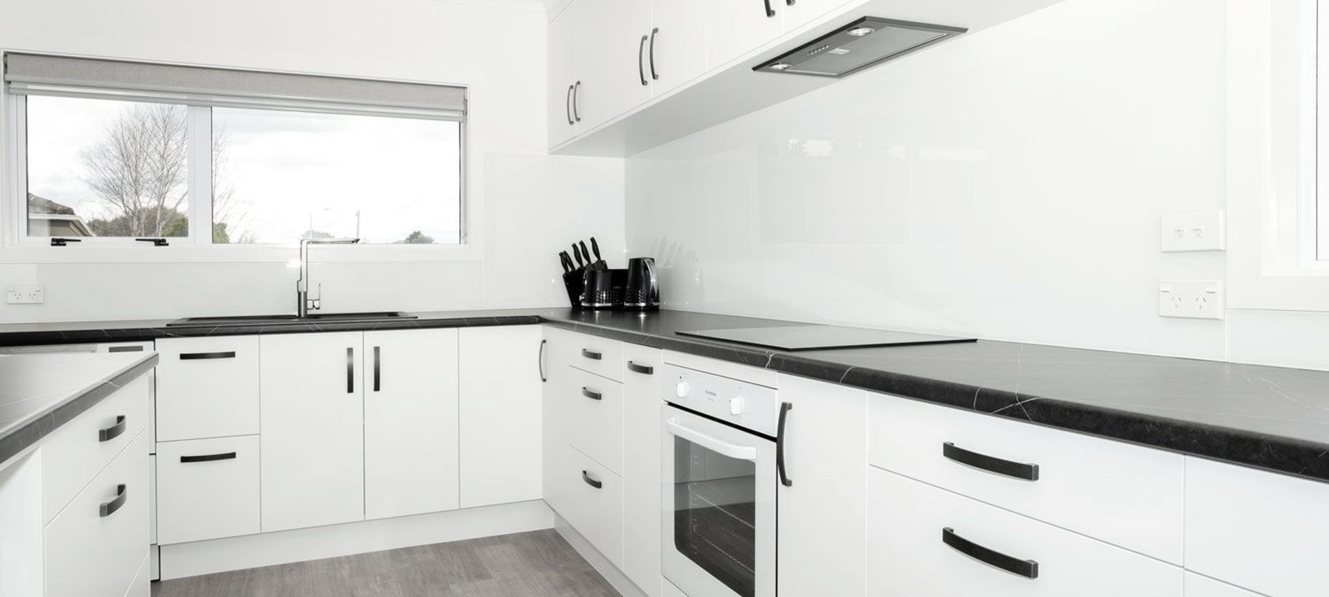 Black and White Interiors Transform 1980s Home banner