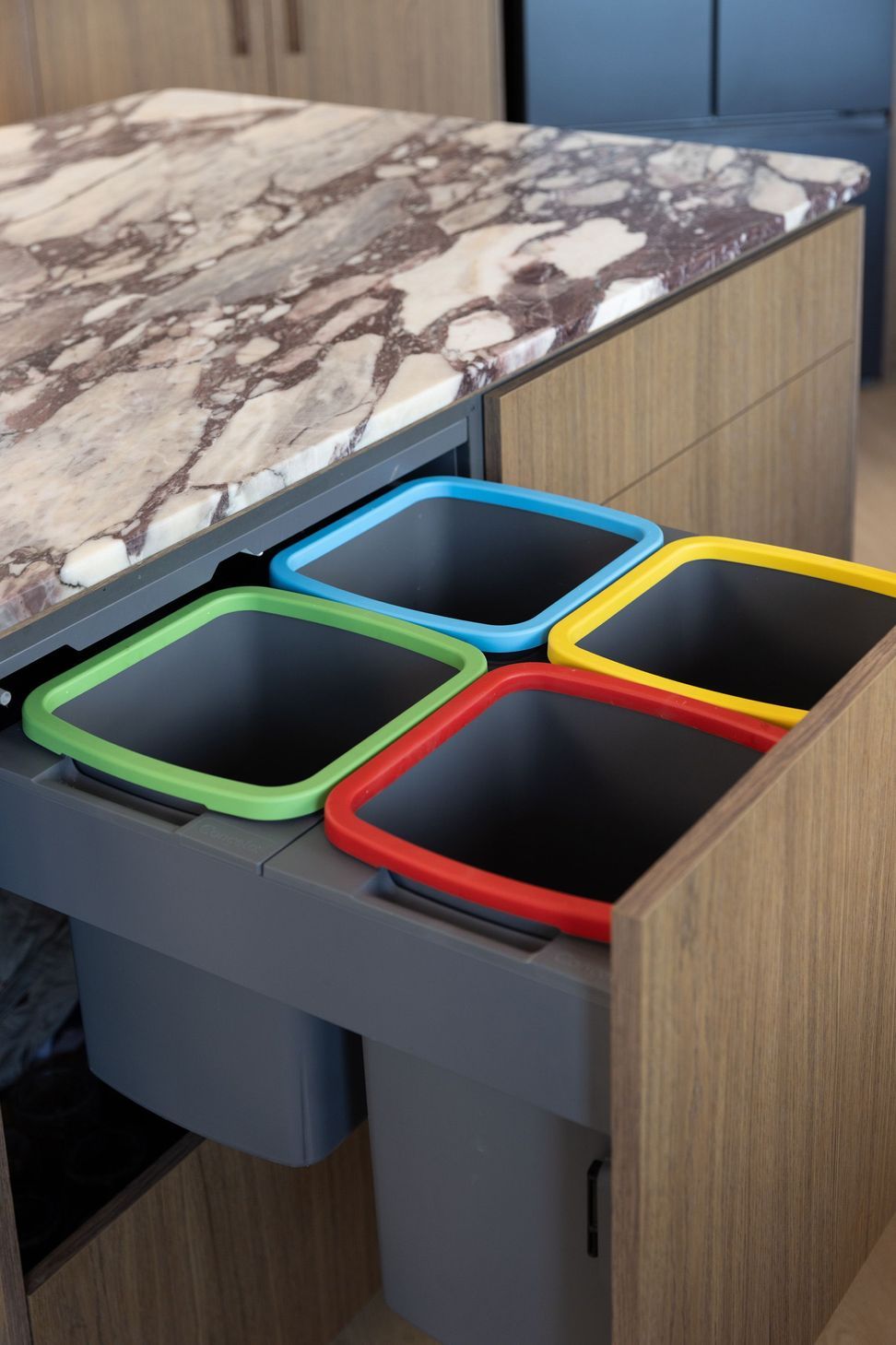 concealed-kitchen-bins-colour-coded-woodgrain-cabinetry-3.jpg