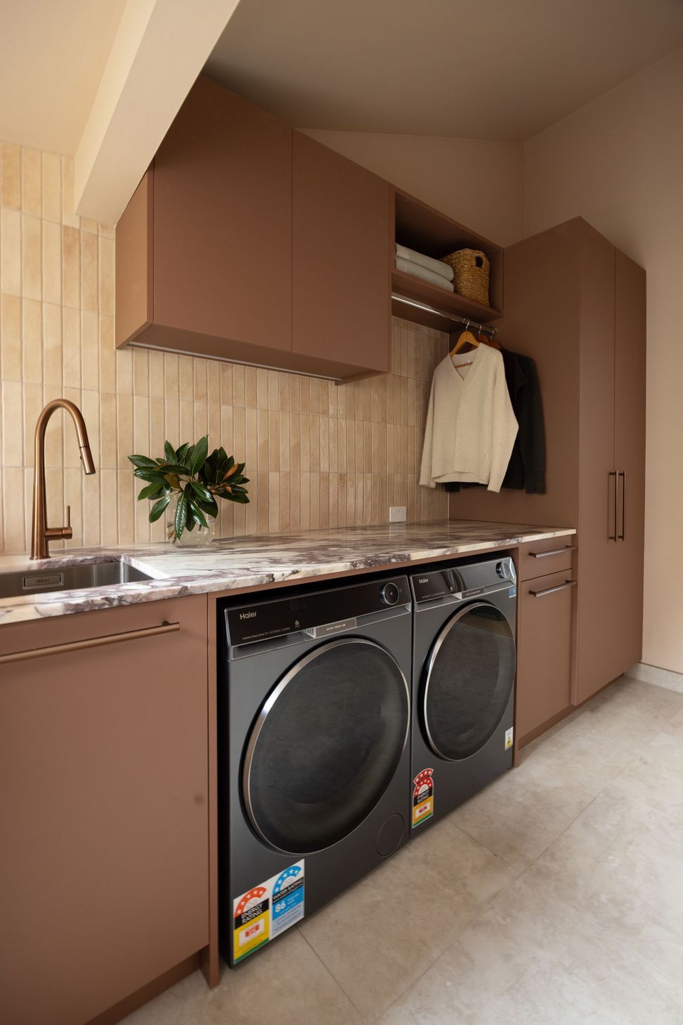 concealed-laundry-hampers-behind-cabinetry-1.jpg