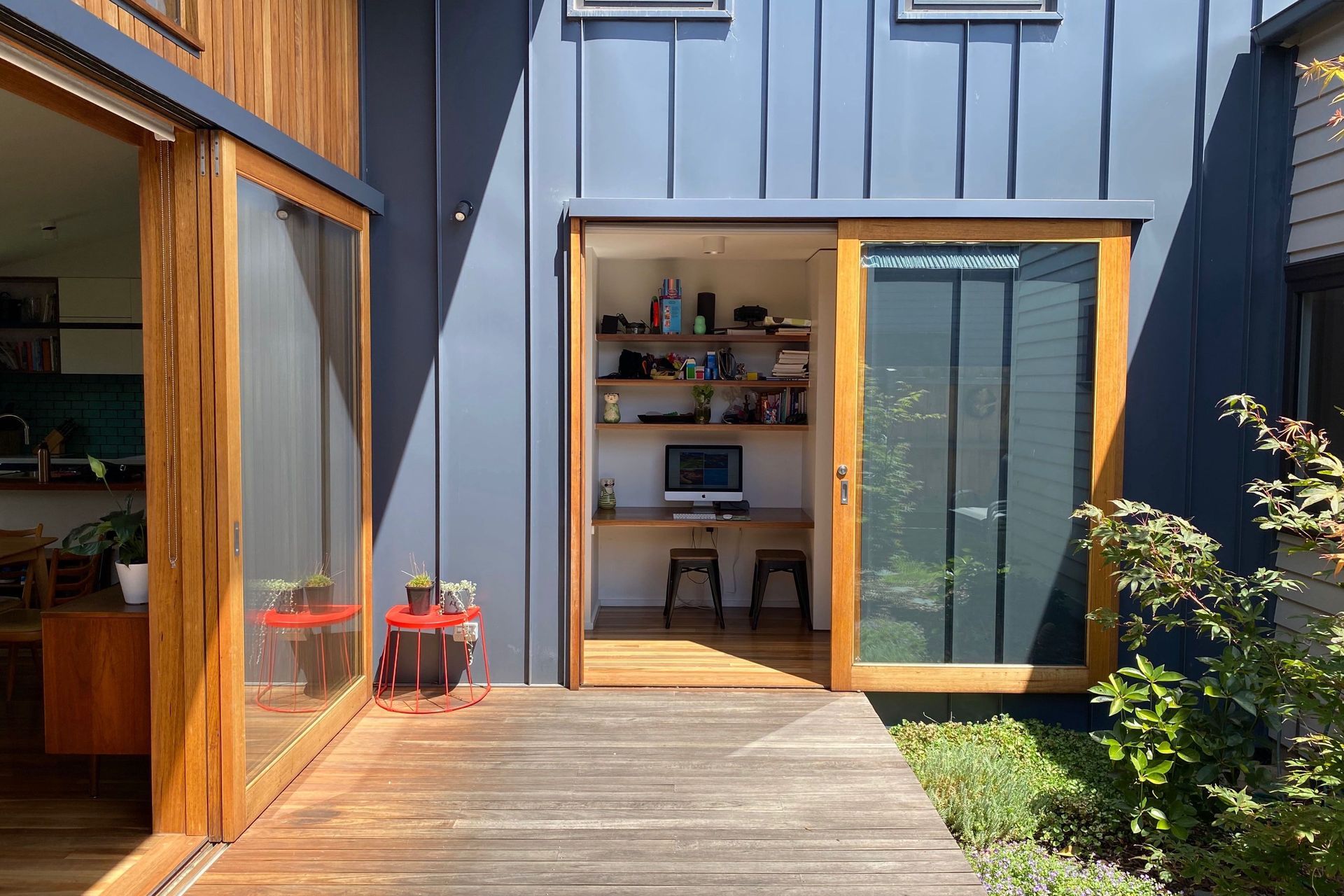 The sunny north-facing deck connects to the living room and a work space in the hallway which is perfect for doing homework
