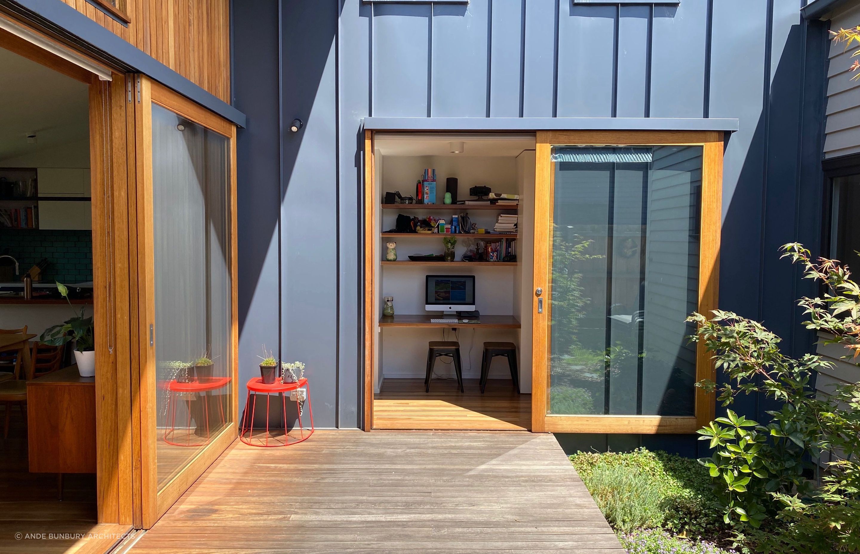 The sunny north-facing deck connects to the living room and a work space in the hallway which is perfect for doing homework