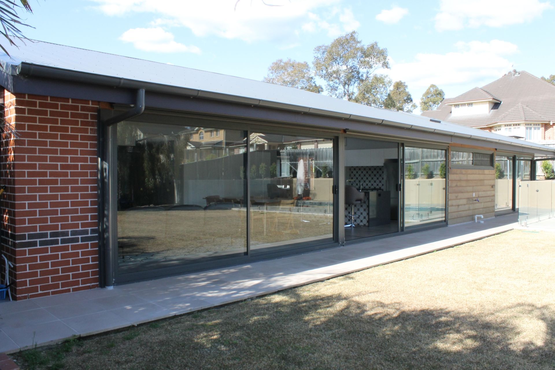 Rear view showing large sliding doors
