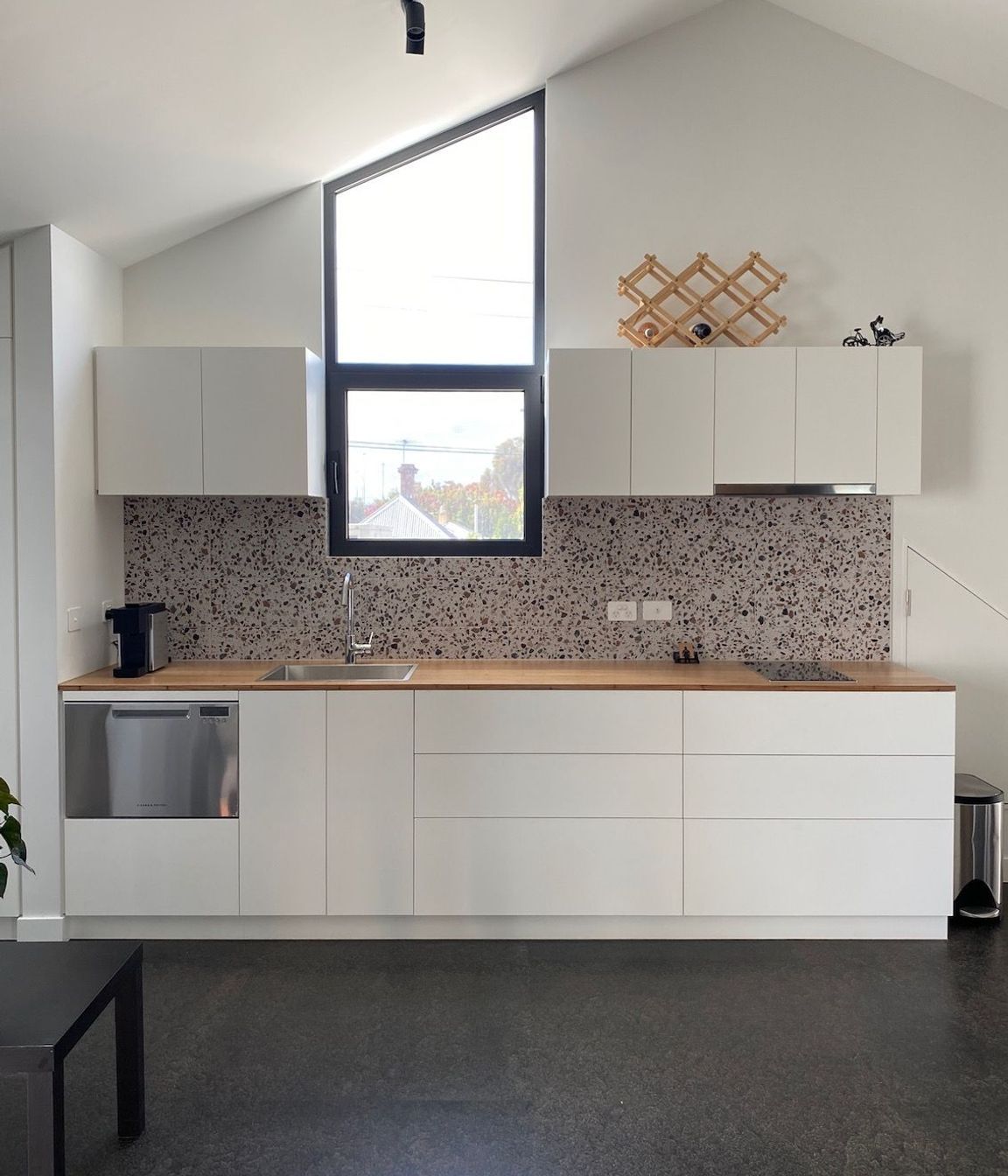 Minimal kitchen with terrazzo splashback