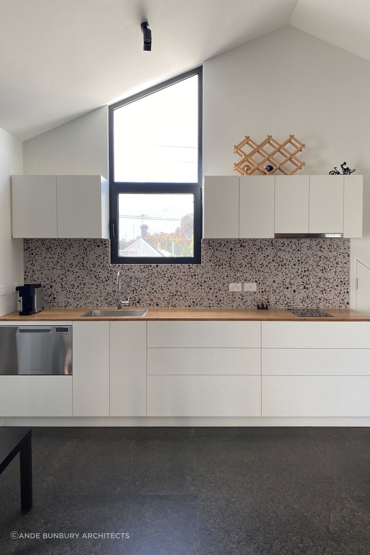 Minimal kitchen with terrazzo splashback