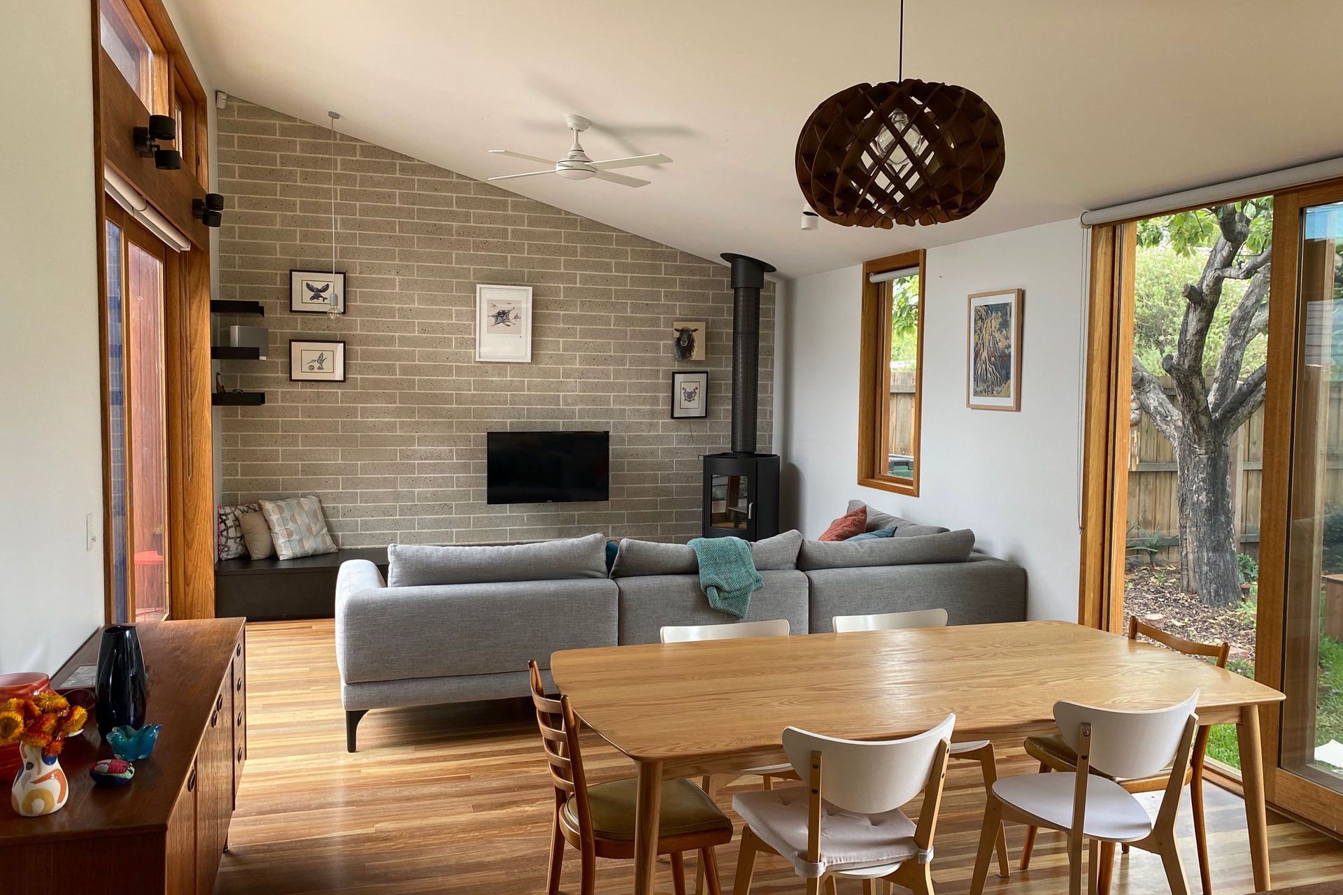 The new living/dining area has good connection to two garden areas