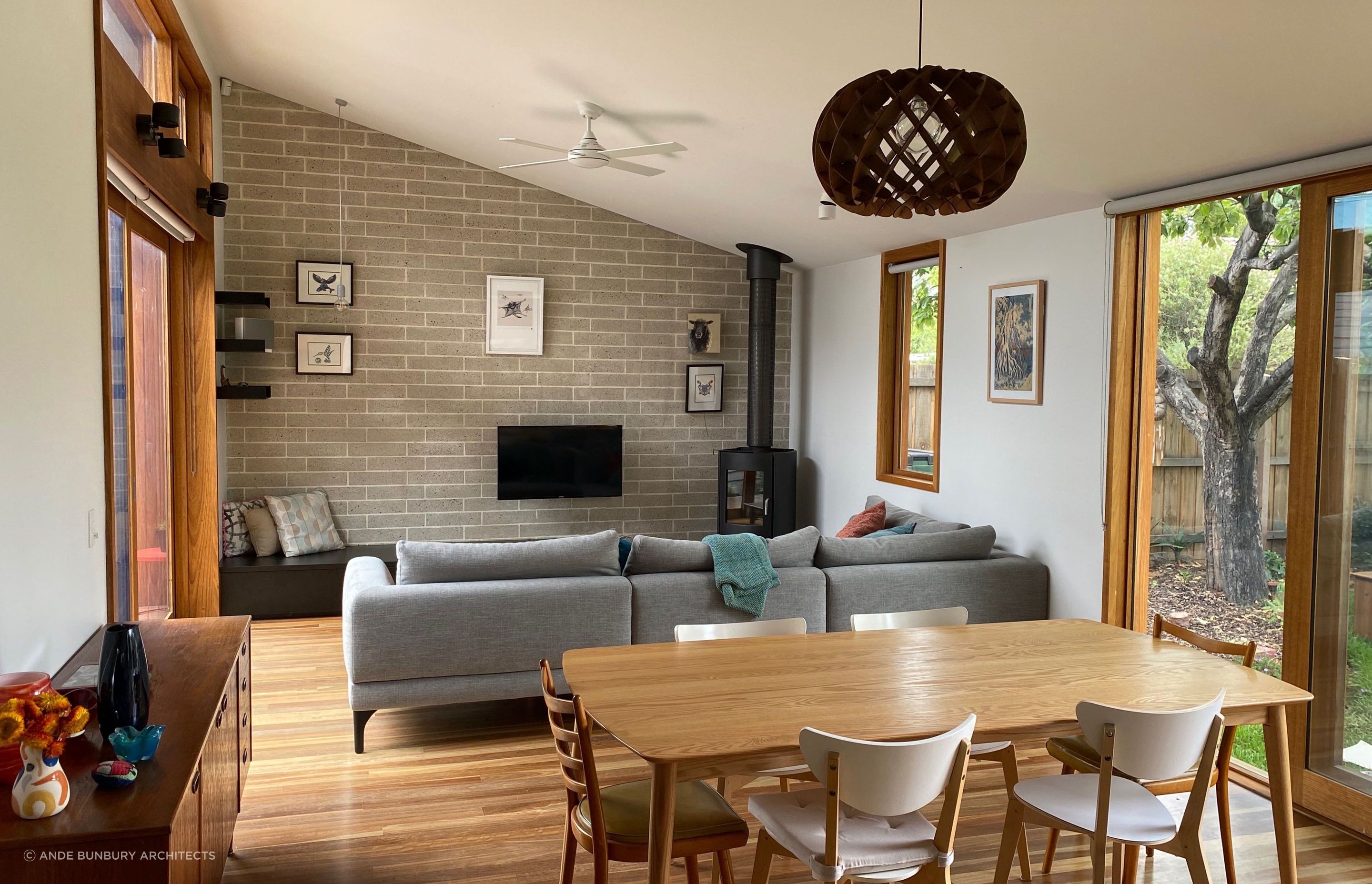 The new living/dining area has good connection to two garden areas